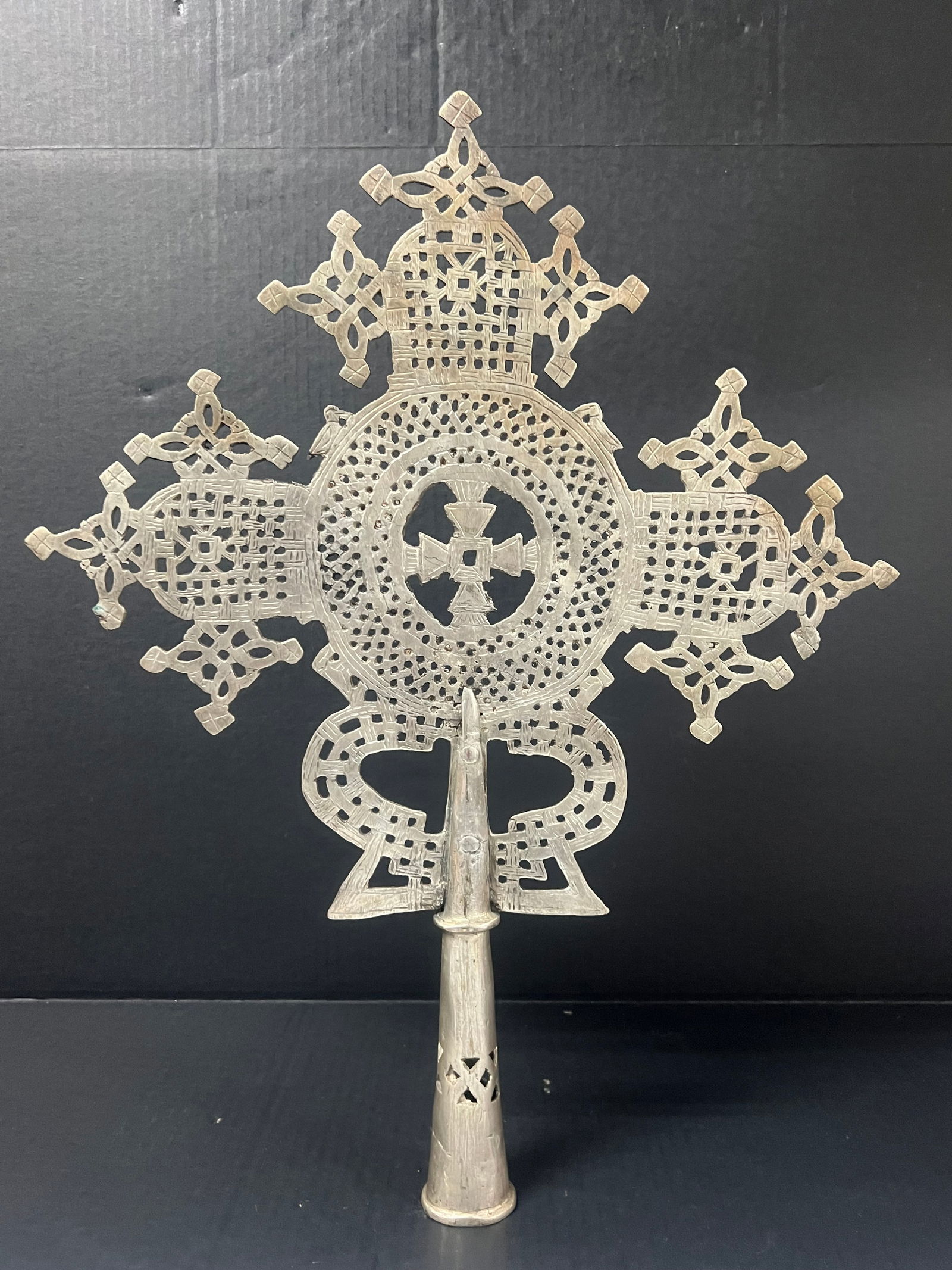 Large Ethiopian Processional Coptic Cross: African Tribal Art Large Ethiopian Processional Coptic Cross. The dimension is 22.5 inches high x 17.5 inches wide. Please be aware that some of the items are vintage, secondhand, old ages, antiques