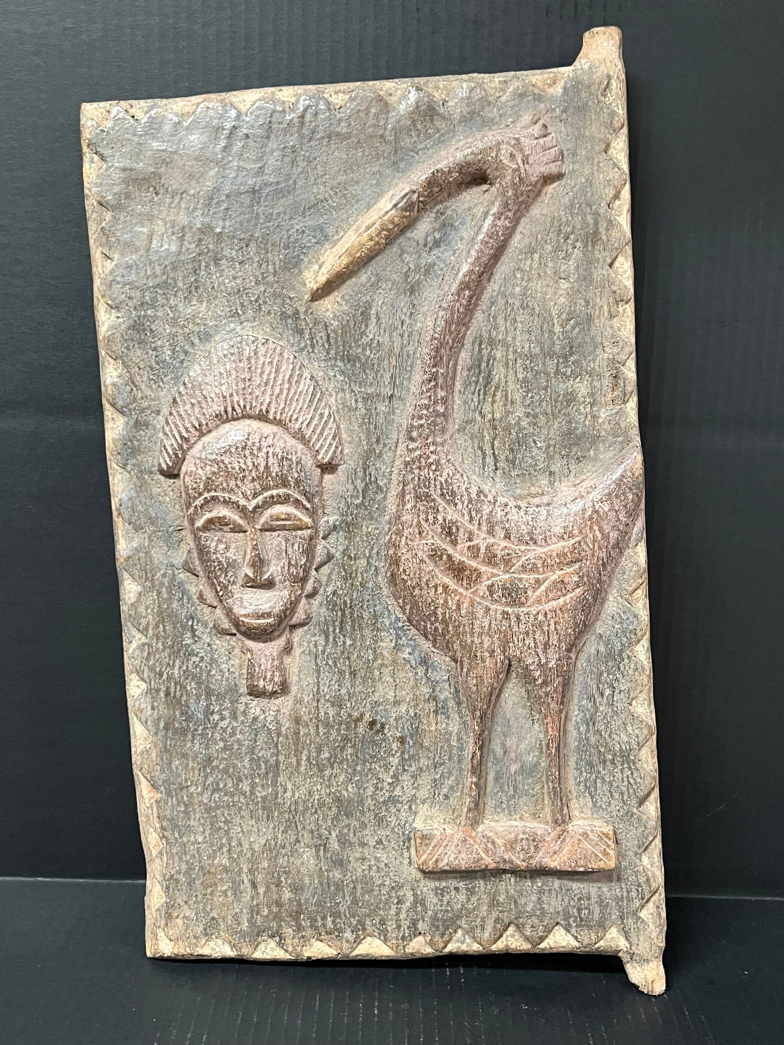Baule Door: African Tribal Art Baule Door. The dimension is 20 inches high x 12 inches wide. Please be aware that some of the items are vintage, secondhand, old ages, antiques and may have a defects or sign of