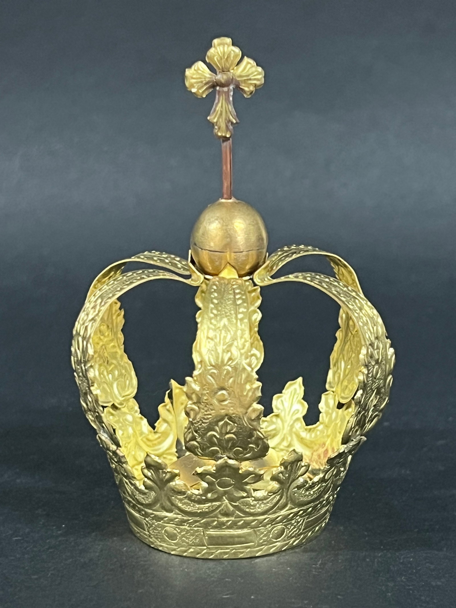 Metal Gilt Crown of Santos: Religious Art Metal Gilt Crown. The dimension is 3.5 inches high x 2.75 inches wide. Opening 1.5 inches wide. Please be aware that some of the items are vintage, secondhand, old ages, antiques and may