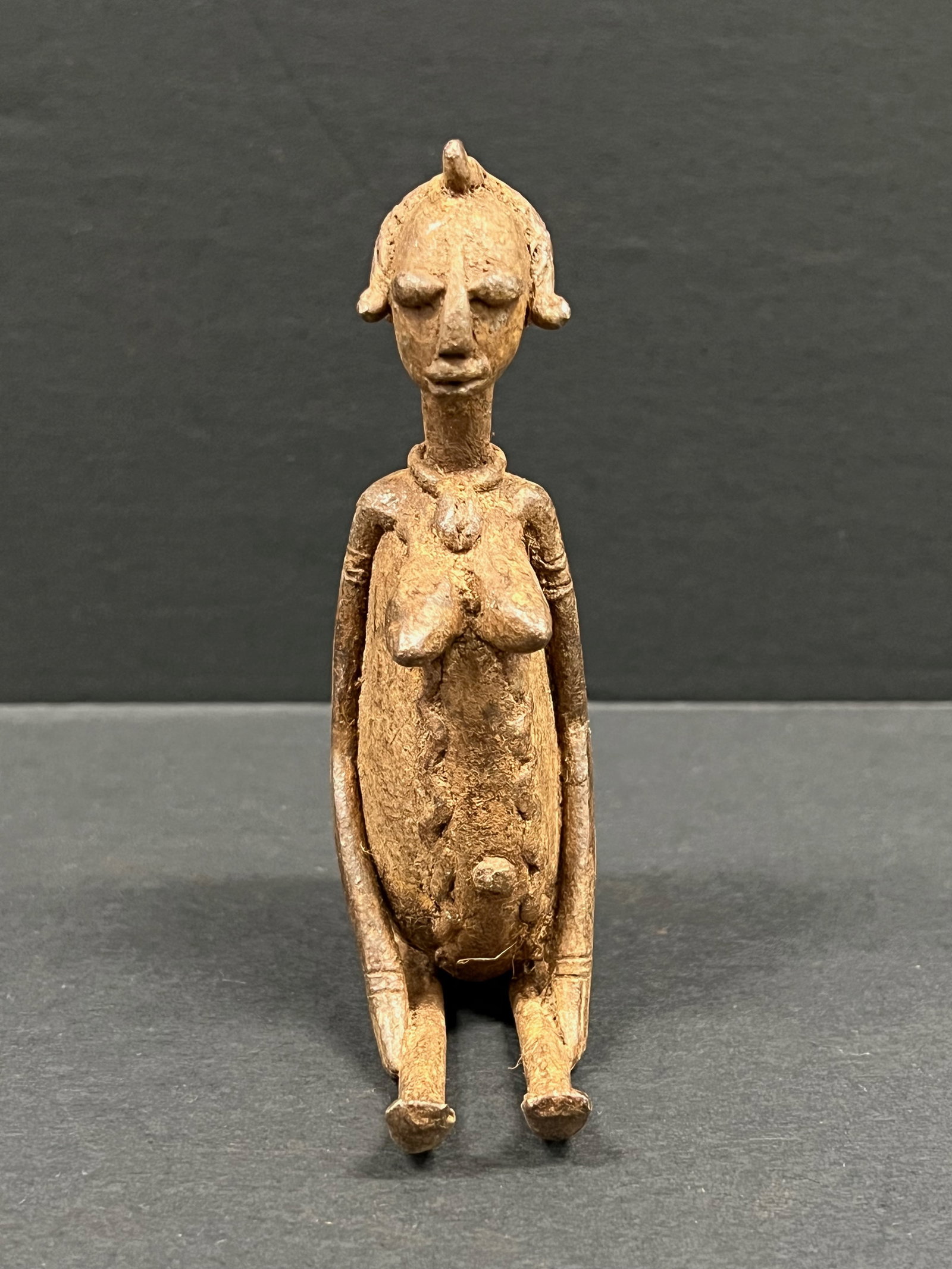 Dogon Bronze Statue: African Tribal Art Dogon Bronze Statue. The dimension is 4.2 inches high x 2.5 inches wide. Please be aware that some of the items are vintage, secondhand, old ages, antiques and may have a defects