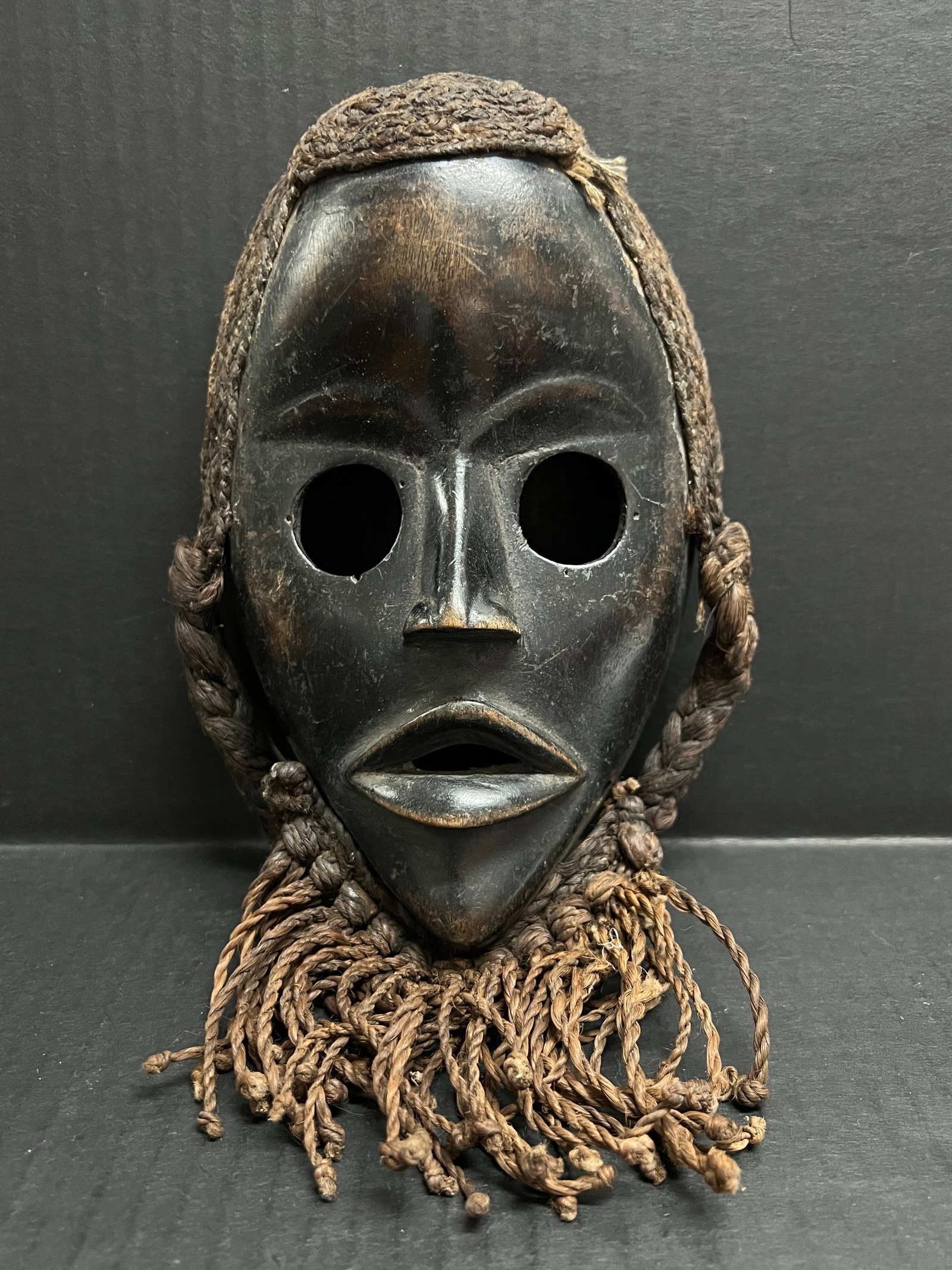 Dan Mask: African Tribal Art Dan Mask. The dimension is 8.5 inches high x 5.25 inches wide. Please be aware that some of the items are vintage, secondhand, old ages, antiques and may have a defects or sign of a