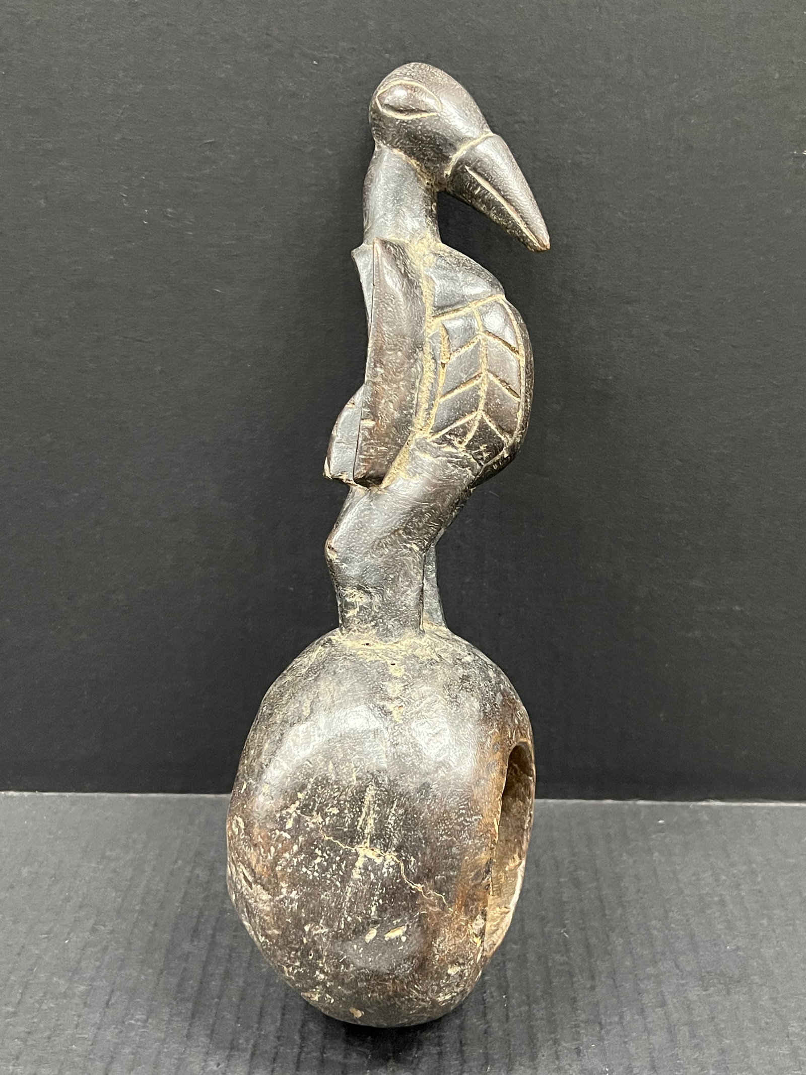 Senufo Spoon: African Tribal Art Senufo Spoon. The dimension is 12.5 inches high x 4.25 inches wide. Please be aware that some of the items are vintage, secondhand, old ages, antiques and may have a defects or