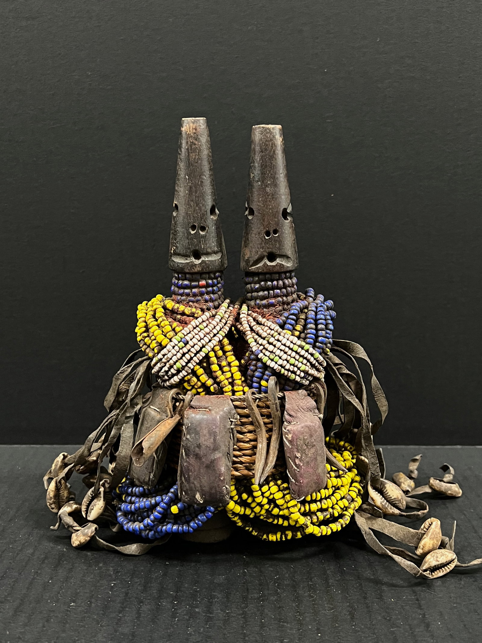 Namji Beaded Doll Statue: African Tribal Art Namji Beaded Doll Statue. The dimension is 9 inches high x 5 inches wide. Please be aware that some of the items are vintage, secondhand, old ages, antiques and may have a defects