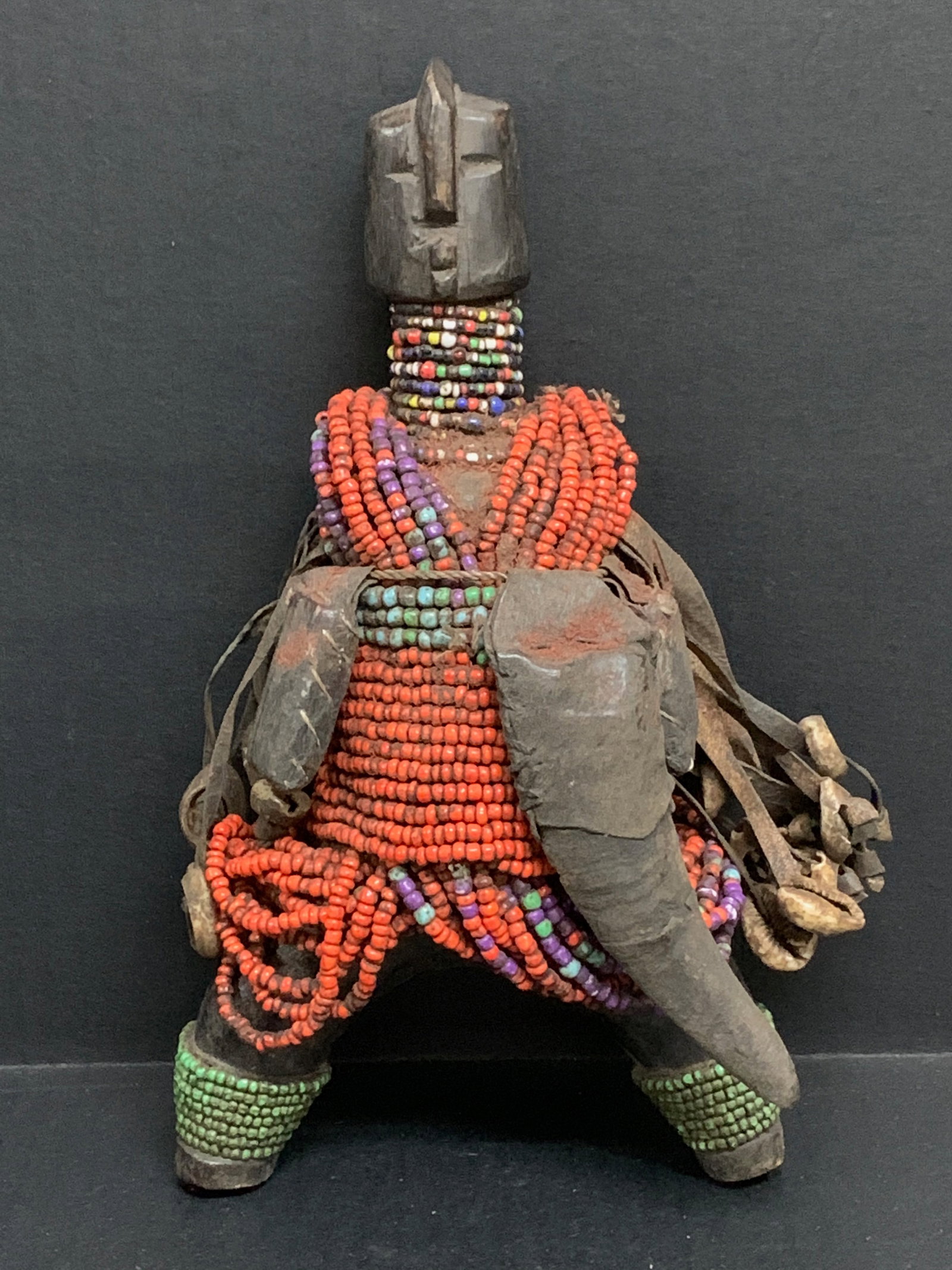 Namji Beaded Doll Statue: African Tribal Art Namji Beaded Doll Statue. The dimension is 10.5 inches high x 5.5 inches wide. Please be aware that some of the items are vintage, secondhand, old ages, antiques and may have a
