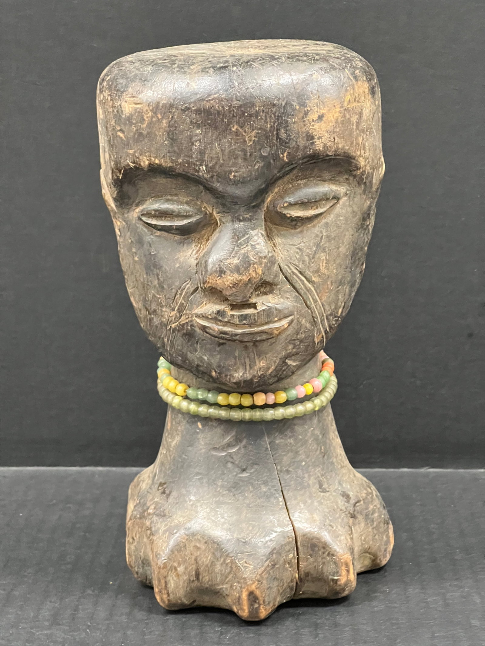 Fang Head Sculpture: African Tribal Art Fang Head Sculpture. The dimension is 9.75 inches high x 4.5 inches wide. Please be aware that some of the items are vintage, secondhand, old ages, antiques and may have a defects