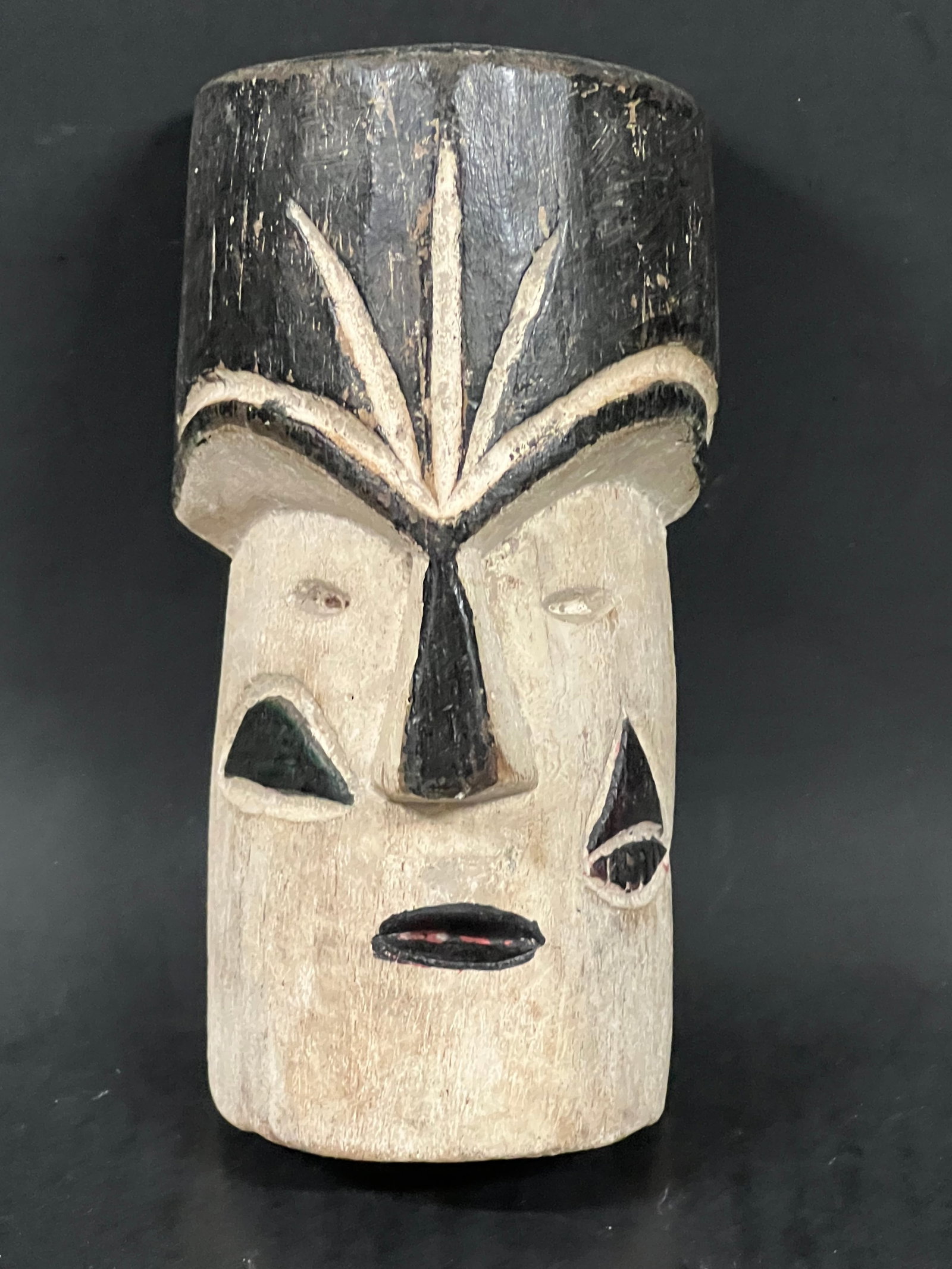 Bembe Passport Mask: African Tribal Art Bembe Passport Mask. The dimension is 5.75 inches high x 4 inches wide. Please be aware that some of the items are vintage, secondhand, old ages, antiques and may have a defects or