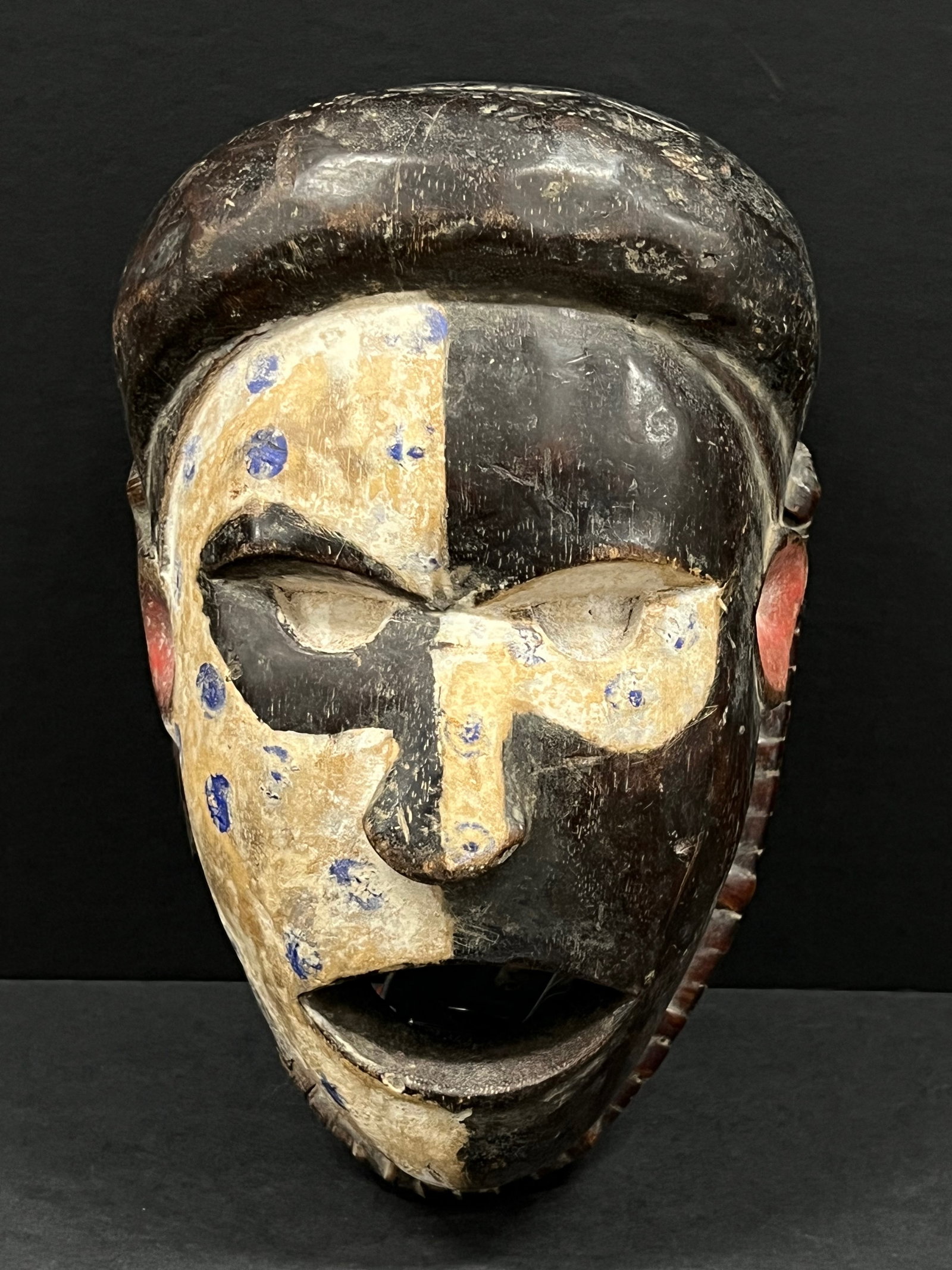 Tabwa Mask: African Tribal Art Tabwa Mask. The dimension is 9.5 inches high x 6.5 inches wide. Please be aware that some of the items are vintage, secondhand, old ages, antiques and may have a defects or sign of