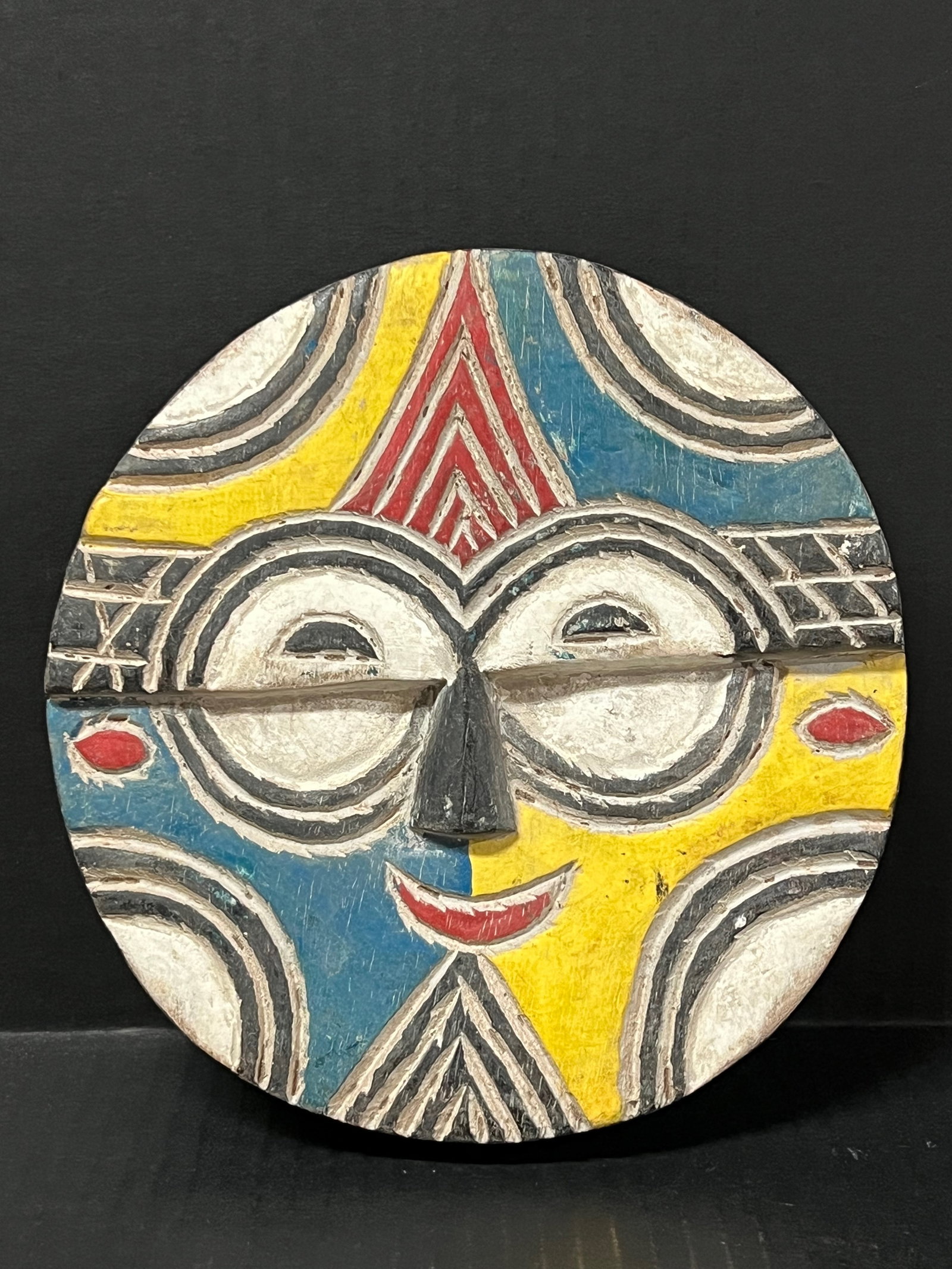 Teke Mask: African Tribal Art Teke Mask. The dimension is 8.25 inches high x8 inches wide. Please be aware that some of the items are vintage, secondhand, old ages, antiques and may have a defects or sign of