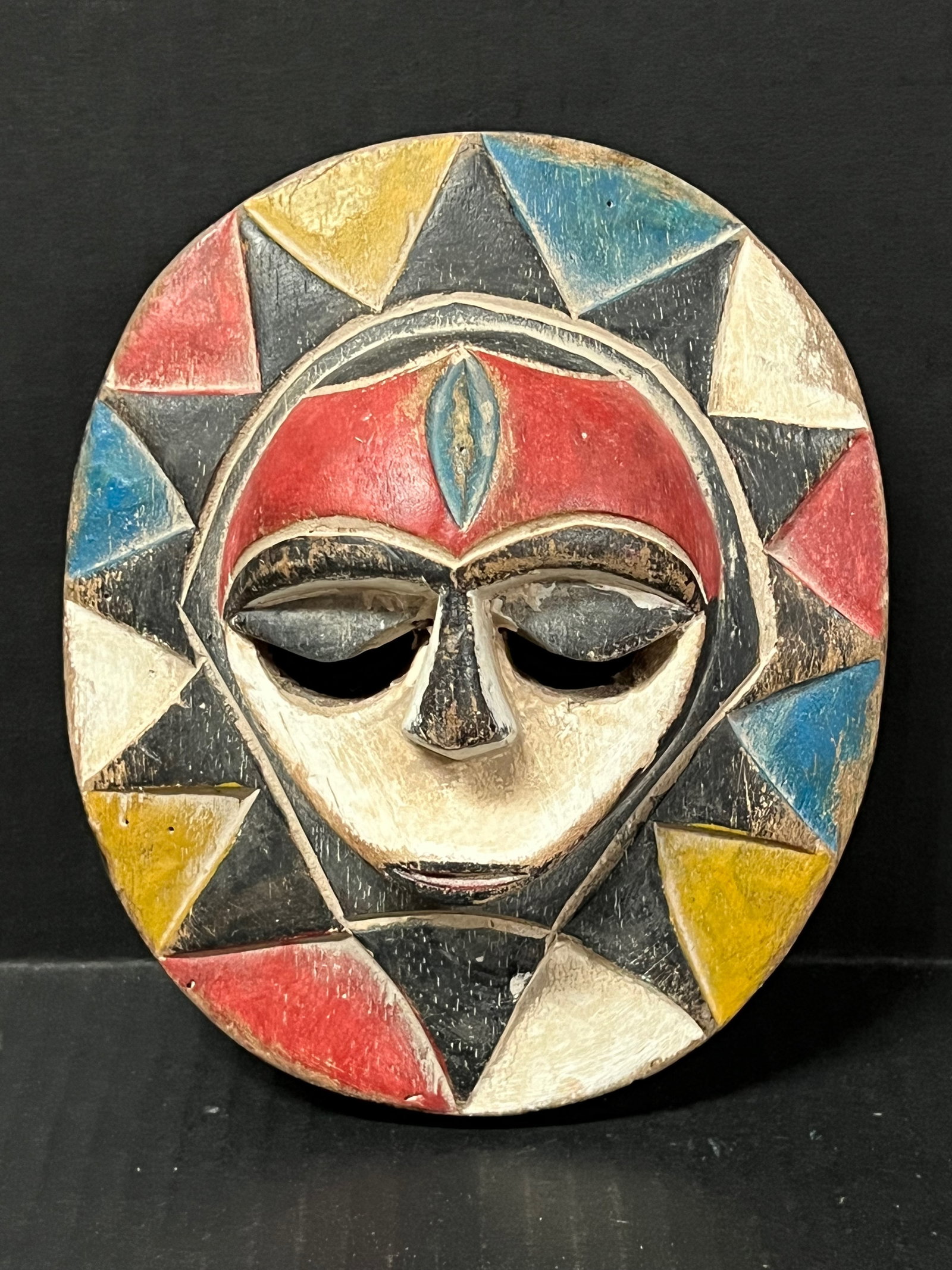 Eket Mask: African Tribal Art Eket Mask. The dimension is 7.25 inches high x 6 inches wide. Please be aware that some of the items are vintage, secondhand, old ages, antiques and may have a defects or sign of