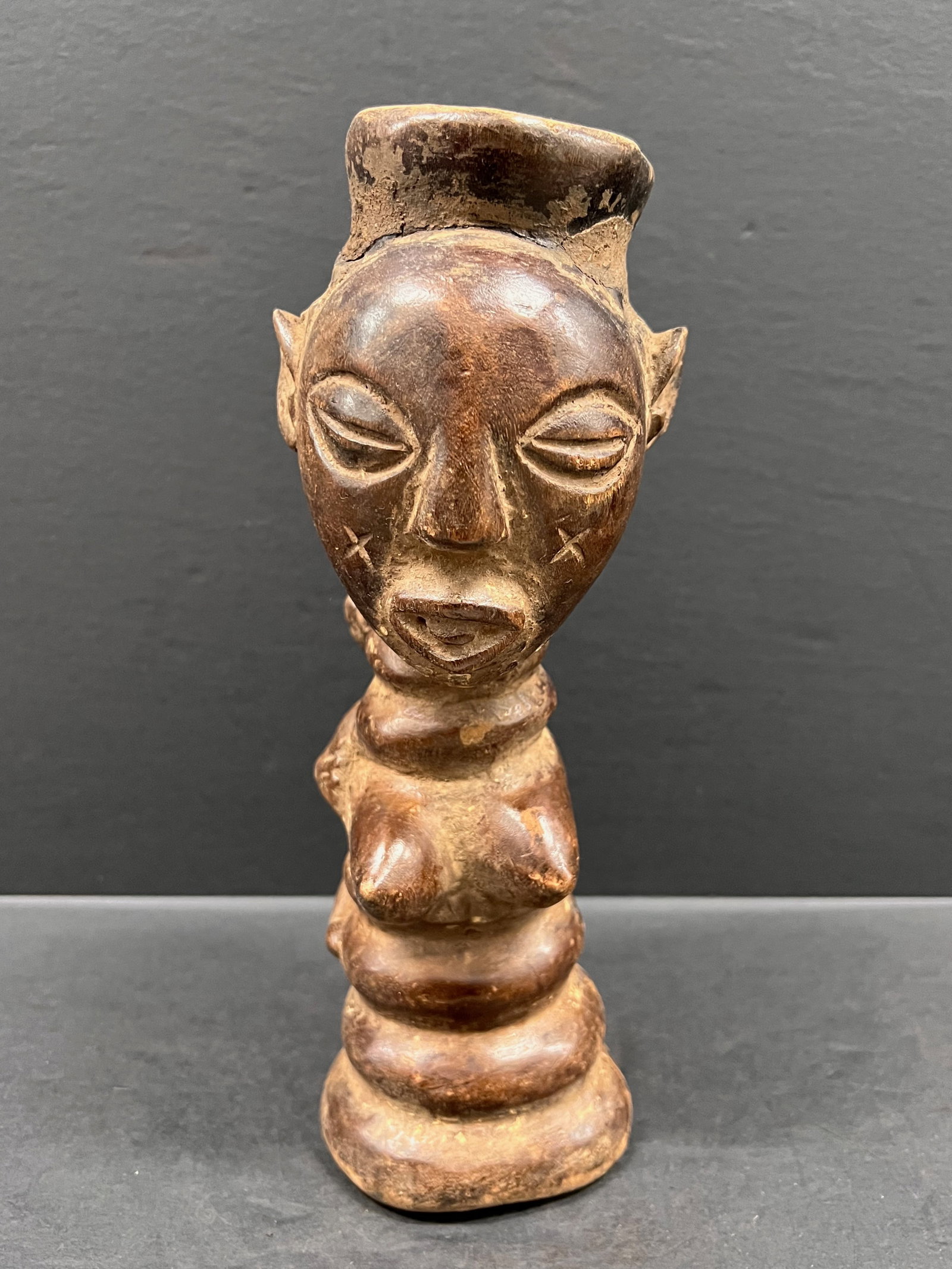Kuba Cup: African Tribal Art Kuba Cup. The dimension is 10.75 inches high x 5 inches depth x 3.5 inches wide. Please be aware that some of the items are vintage, secondhand, old ages, antiques and may have a