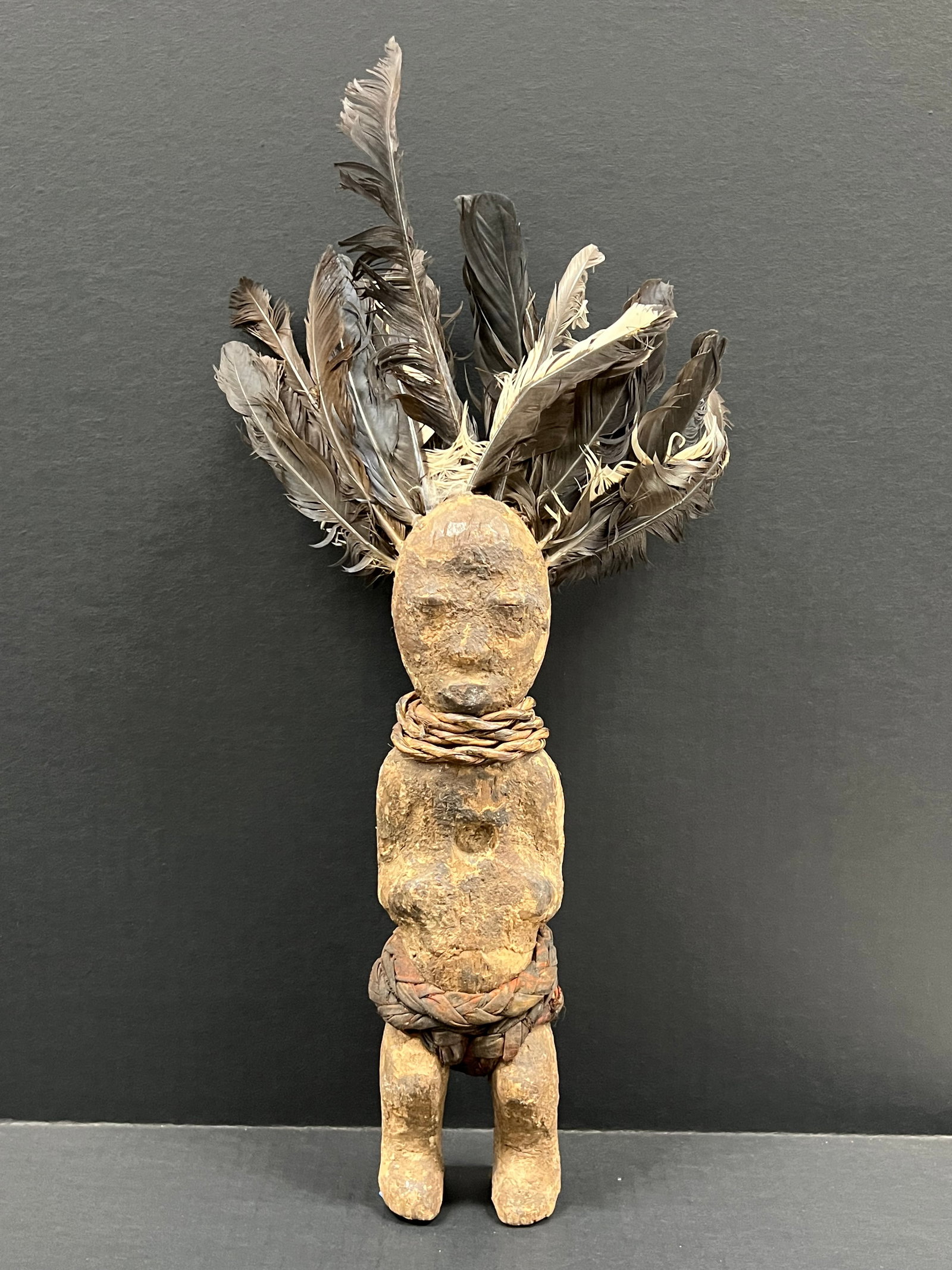 Ogomo Statue: African Tribal Art Ogomo Statue. The dimension is 13 inches high x 3.5 inches wide. Please be aware that some of the items are vintage, secondhand, old ages, antiques and may have a defects or sign