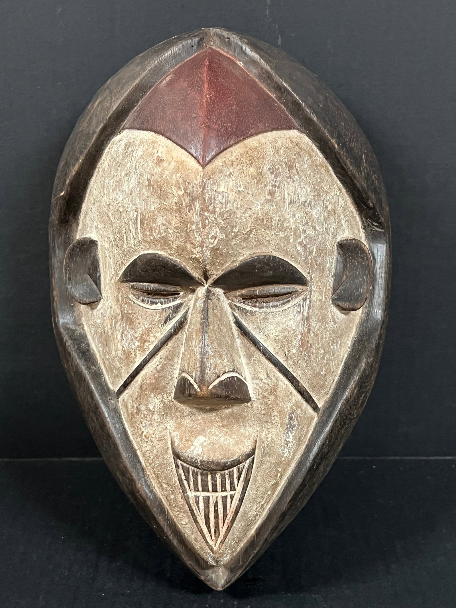 Ibo Mask: African Tribal Art Ibo Mask. The dimension is 13.5 inches high x 9 inches wide. Please be aware that some of the items are vintage, secondhand, old ages, antiques and may have a defects or sign of age
