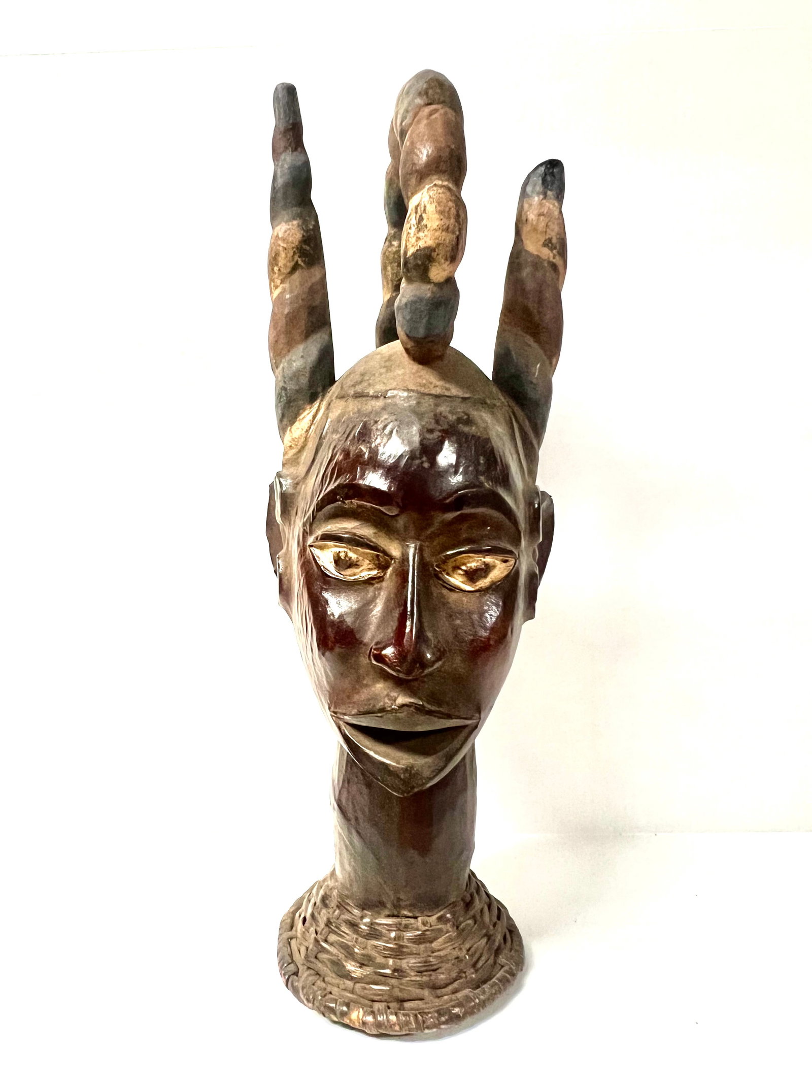 Ekoi Head Covered with Leather Skin Statue: African Tribal Art Ekoi Head Covered with Leather Skin Statue. The dimension is 20.5 inches high x 8.5 inches wide. Please be aware that some of the items are vintage, secondhand, old ages, antiques