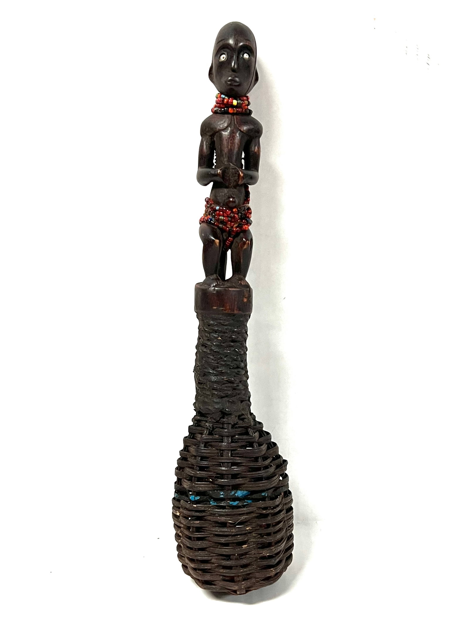 Fang Rattle: African Tribal Art Fang Rattle. The dimension is 12.5 inches high x 3 inches wide. Please be aware that some of the items are vintage, secondhand, old ages, antiques and may have a defects or sign of