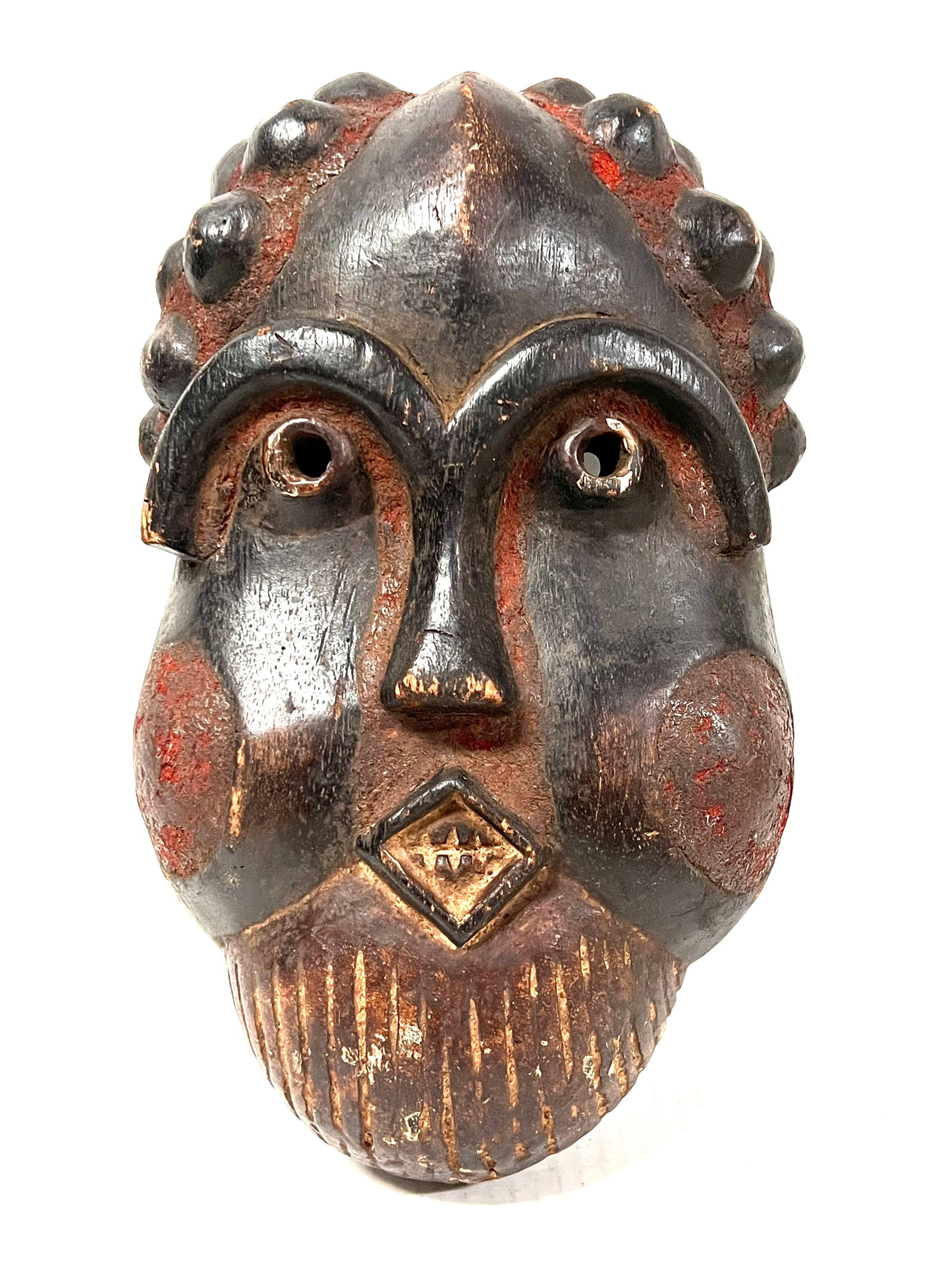 Bamun Mask: African Tribal Art Bamun Mask. The dimension is 12.5 inches high x 8 inches wide. Please be aware that some of the items are vintage, secondhand, old ages, antiques and may have a defects or sign of