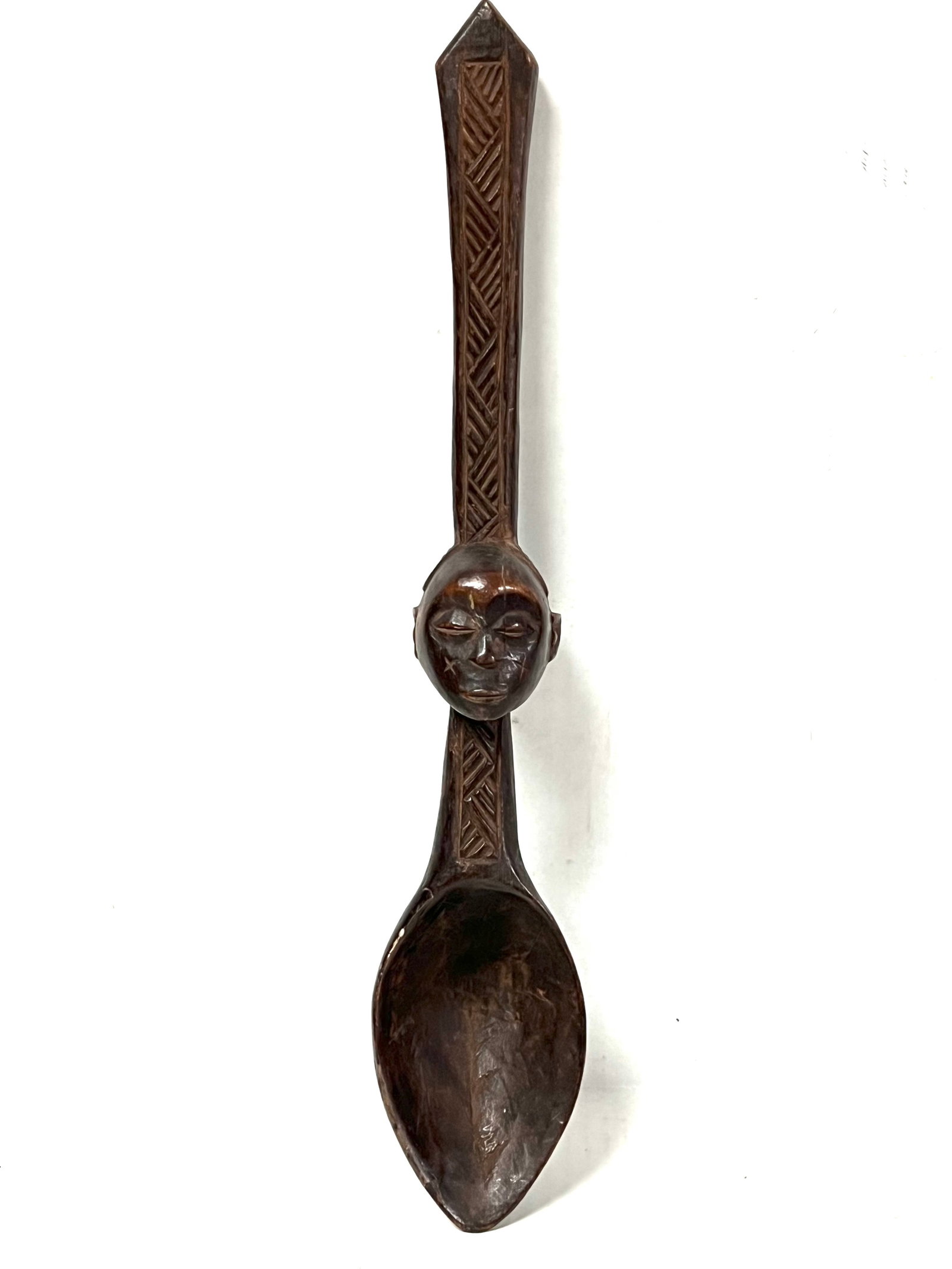 Kuba Wooden Spoon: African Tribal Art Kuba Wooden Spoon. The dimension is 15.5 inches high x 2.75 inches wide. Please be aware that some of the items are vintage, secondhand, old ages, antiques and may have a defects