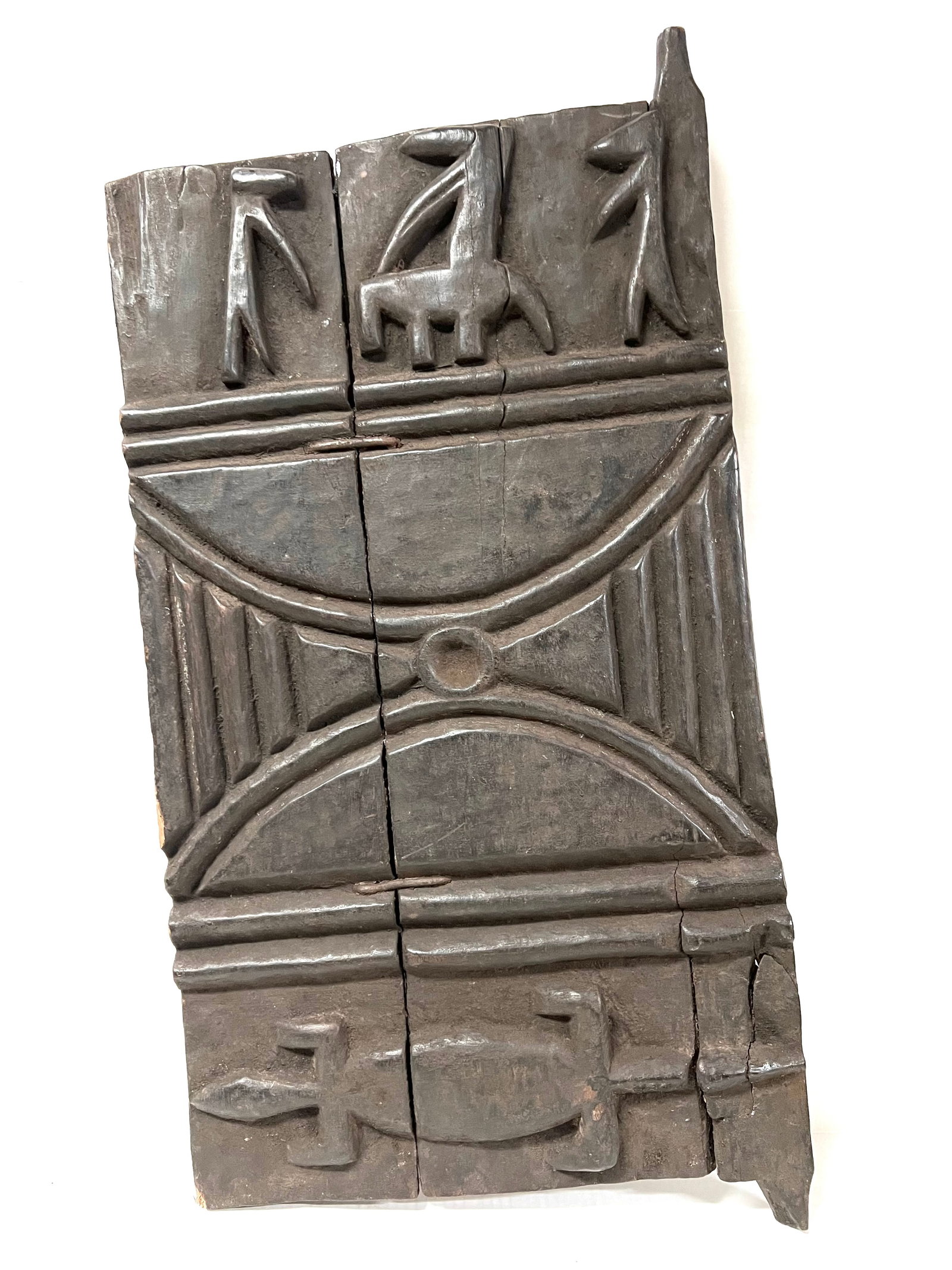 Dogon Door: African Tribal Art Dogon Door. The dimension is 31 inches high x 15.5 inches wide. Please be aware that some of the items are vintage, secondhand, old ages, antiques and may have a defects or sign of 