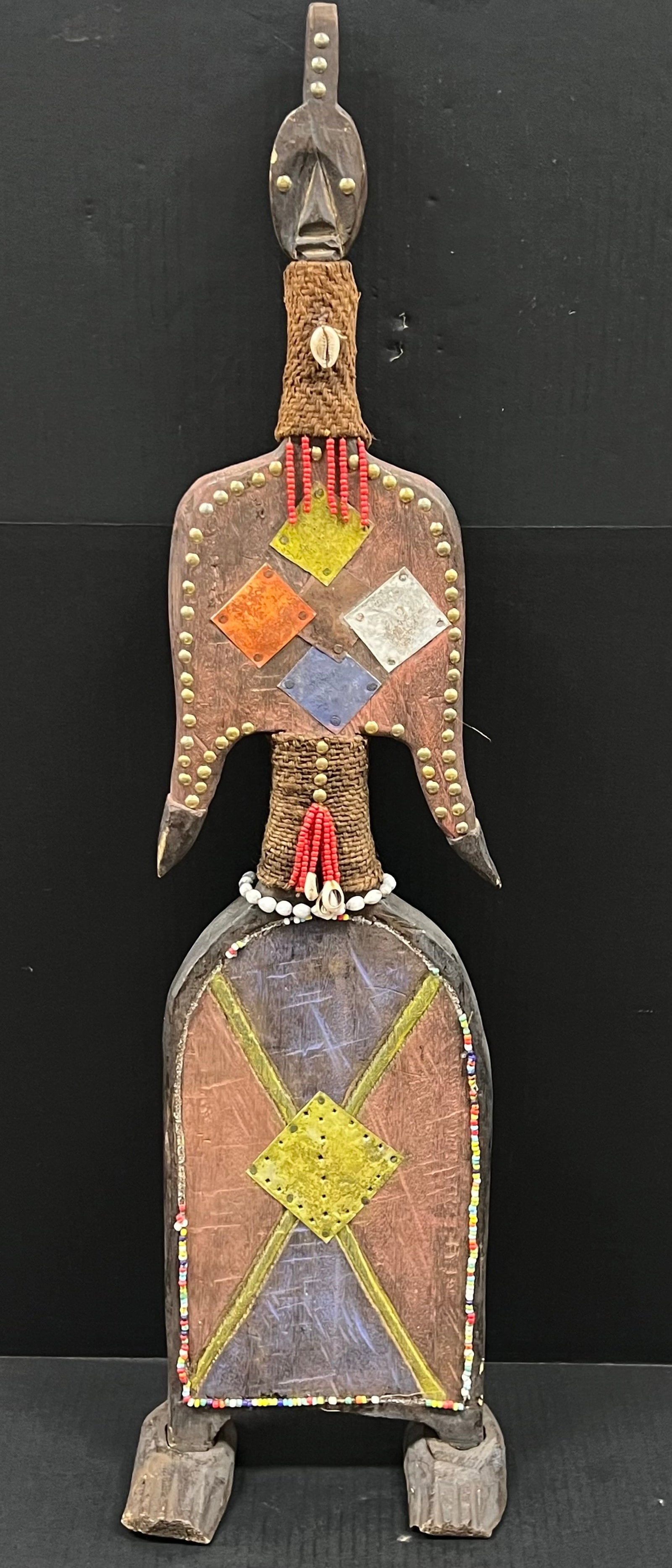 Namji Doll Statue: African Tribal Art Namji Doll Statue. The dimension is 35.5 inches high x 4.5 inches depth x 9.5 inches wide. Please be aware that some of the items are vintage, secondhand, old ages, antiques and