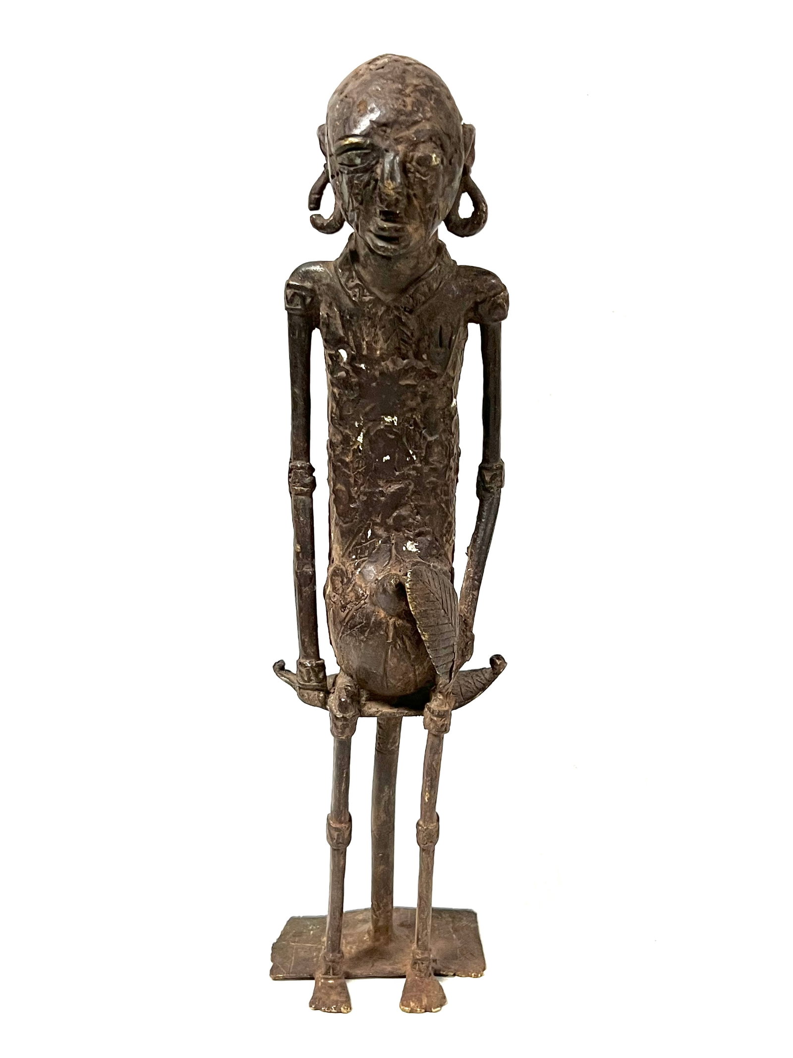 Dogon Bronze Statue: African Tribal Art Dogon Bronze Statue. The dimension is 15.5 inches high x 4 inches wide. Please be aware that some of the items are vintage, secondhand, old ages, antiques and may have a defects or