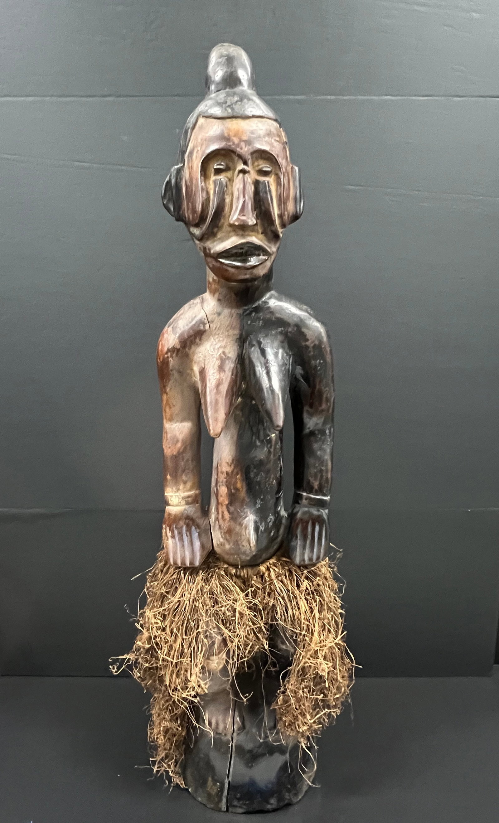 Large Igbo Statue: African Tribal Art Large Igbo Statue. The dimension is 35.5 inches high x 9 inches wide. Please be aware that some of the items are vintage, secondhand, old ages, antiques and may have a defects or