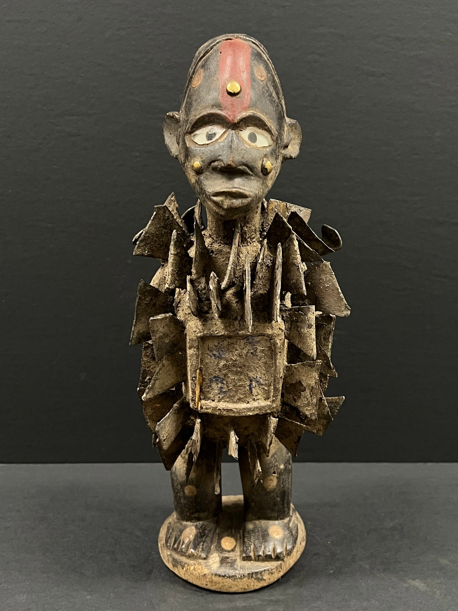 Bacongo Nail Fetish: African Tribal Art Bacongo Nail Fetish. The dimension is 13.5 inches high x 4.5 inches wide. Please be aware that some of the items are vintage, secondhand, old ages, antiques and may have a defects
