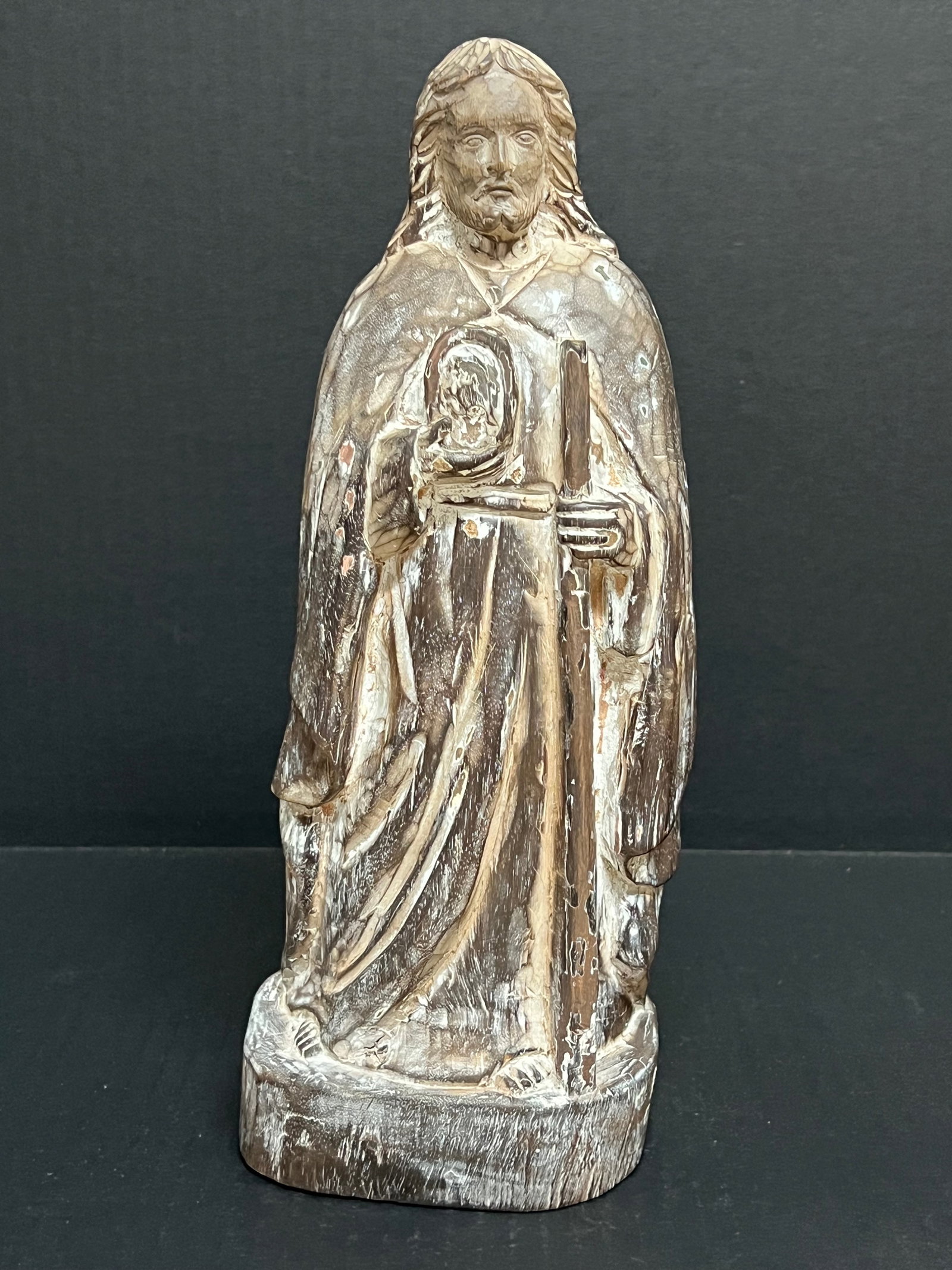 Carved Wood Saint Jude: Religious Art Carved Wood Saint Jude. The dimension is 12.5 inches high x 4.25 inches wide. Please be aware that some of the items are vintage, secondhand, old ages, antiques and may have a defects or