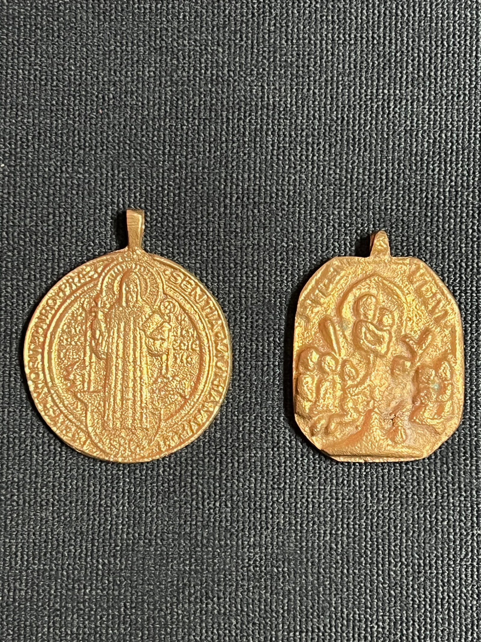 Set of 2 Cast Brass Metal Medal/Amulet: Religious Art Set of 2 Cast Brass Metal Medal/Amulet. The dimension is 2.25 inches high x 1.75 inches wide and 2 inches high x 1.5 inches wide. Please be aware that some of the items are vintage, seco