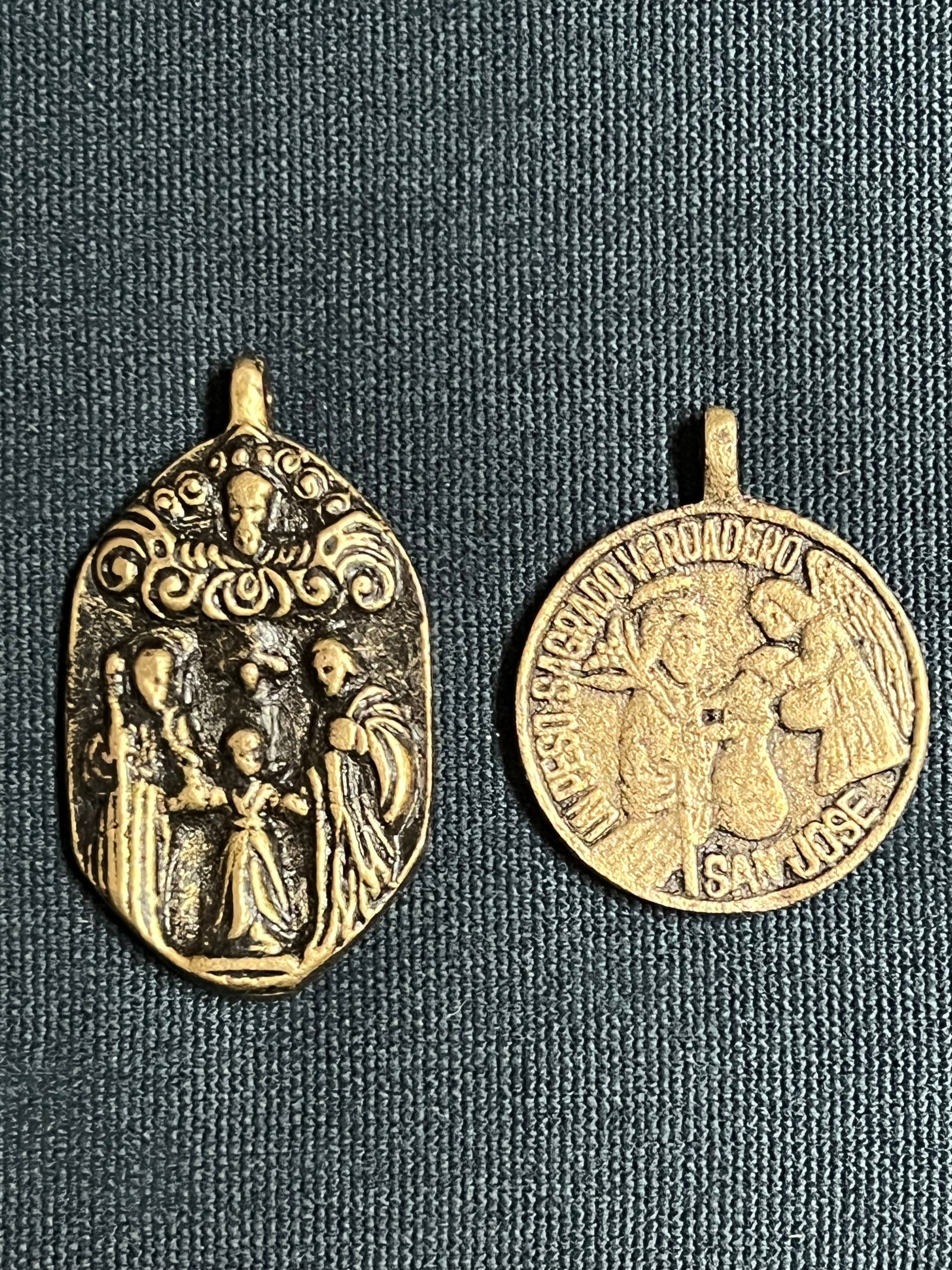 Set of 2 Cast Brass Metal Medal/Amulet: Religious Art Set of 2 Cast Brass Metal Medal/Amulet. The dimension is 2 inches high x 1.75 inches wide and 2.5 inches high x 1.5 inches wide. Please be aware that some of the items are vintage, secon