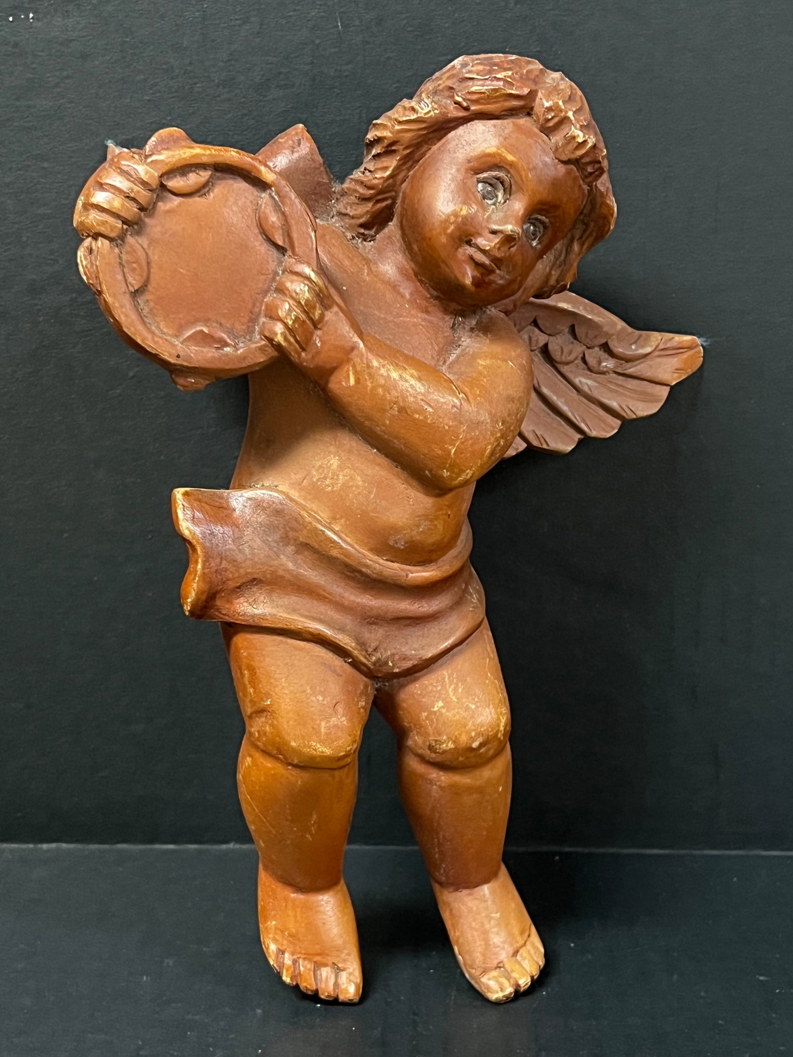 Carved Wood Angel Playing Musical Instrument: Religious Art Carved Wood Angel Playing Musical Instrument. The dimension is 10 inches high x 7.5 inches wide. Please be aware that some of the items are vintage, secondhand, old ages, antiques and ma