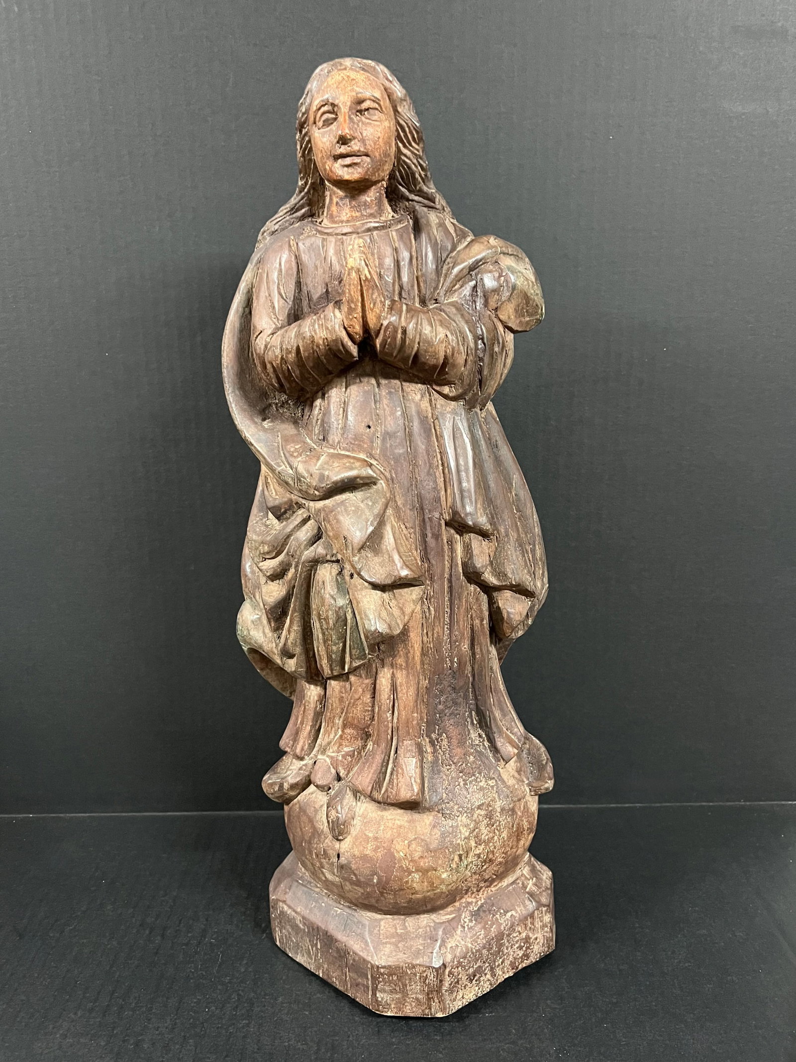 Carved Wood Blessed Virgin Mary Sculpture: Religious Art Carved Wood Blessed Virgin Mary Sculpture. The dimension is 20.5 inches high x 7 inches depth x 7 inches wide. Please be aware that some of the items are vintage, secondhand, old ages, a