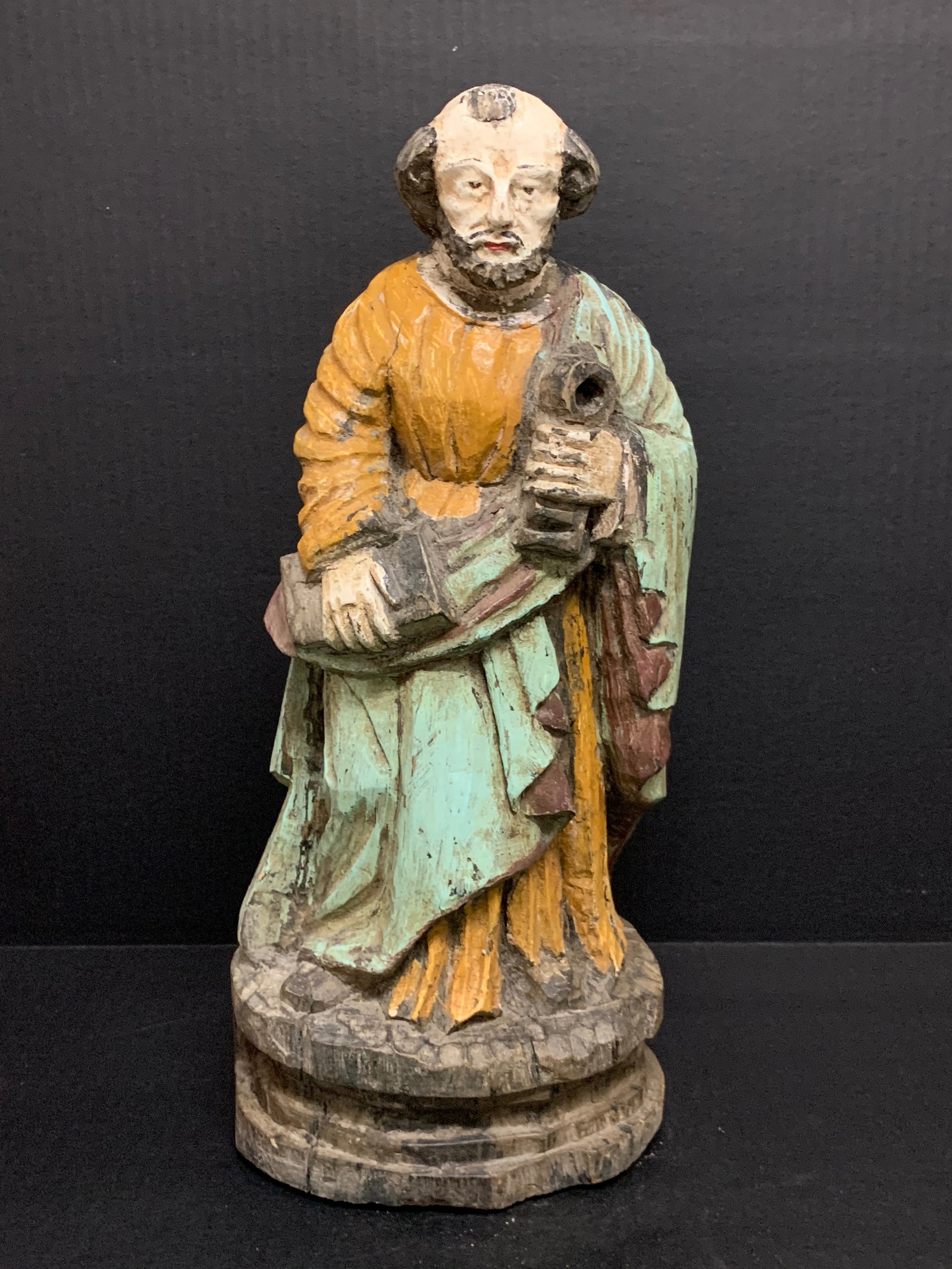 Carved Wood Saint Peter Statue: Religious Art Carved Wood Saint Peter Statue. The dimension is 16.5 inches high x 7 inches wide. Please be aware that some of the items are vintage, secondhand, old ages, antiques and may have a defec