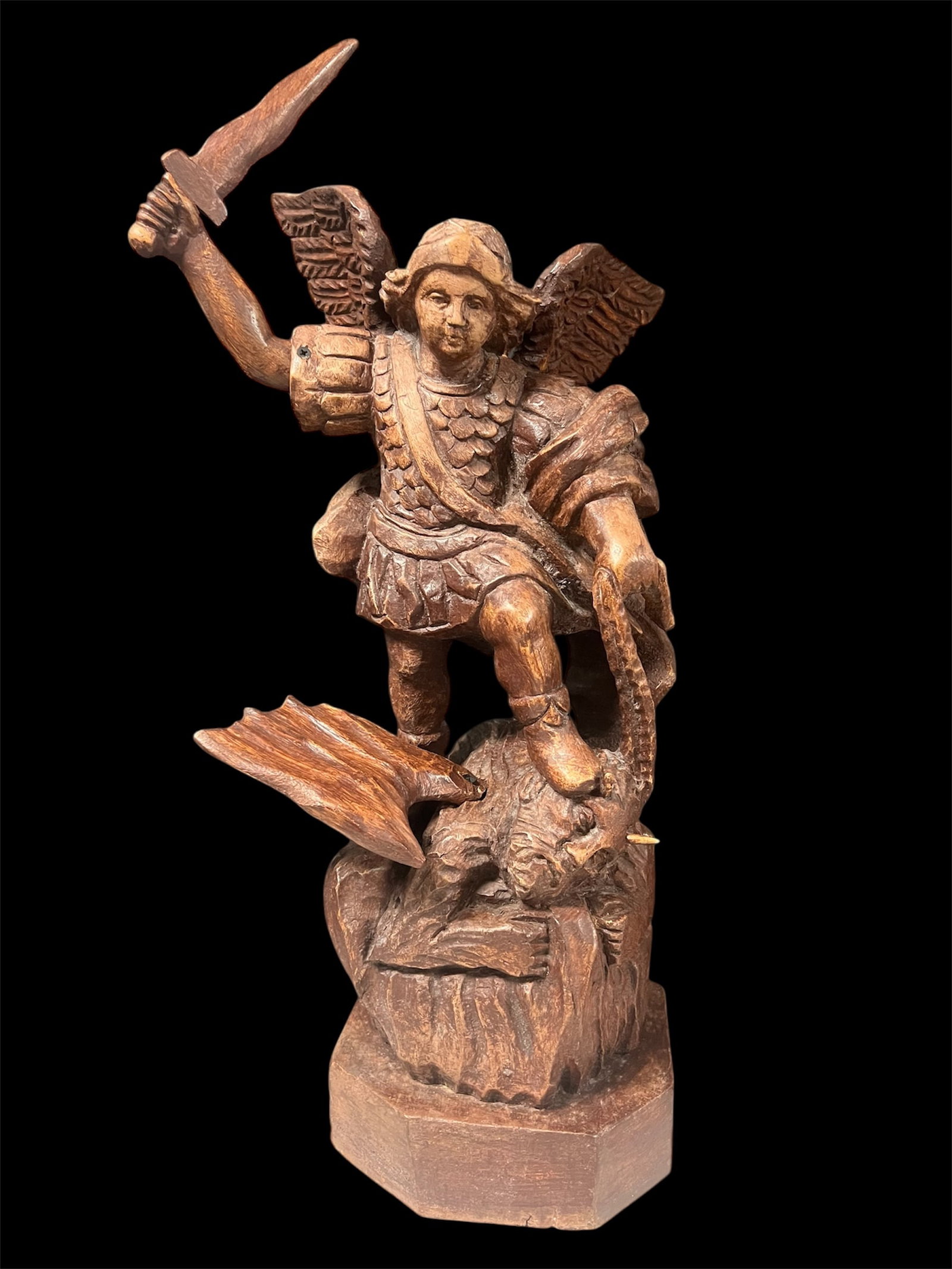 Carved Wood Saint Michael Angelo Statue: Religious Art Carved Wood Saint Michael Angelo Statue. The dimension is 26 inches high x 14 inches depth x 13 inches wide. Please be aware that some of the items are vintage, secondhand, old ages,