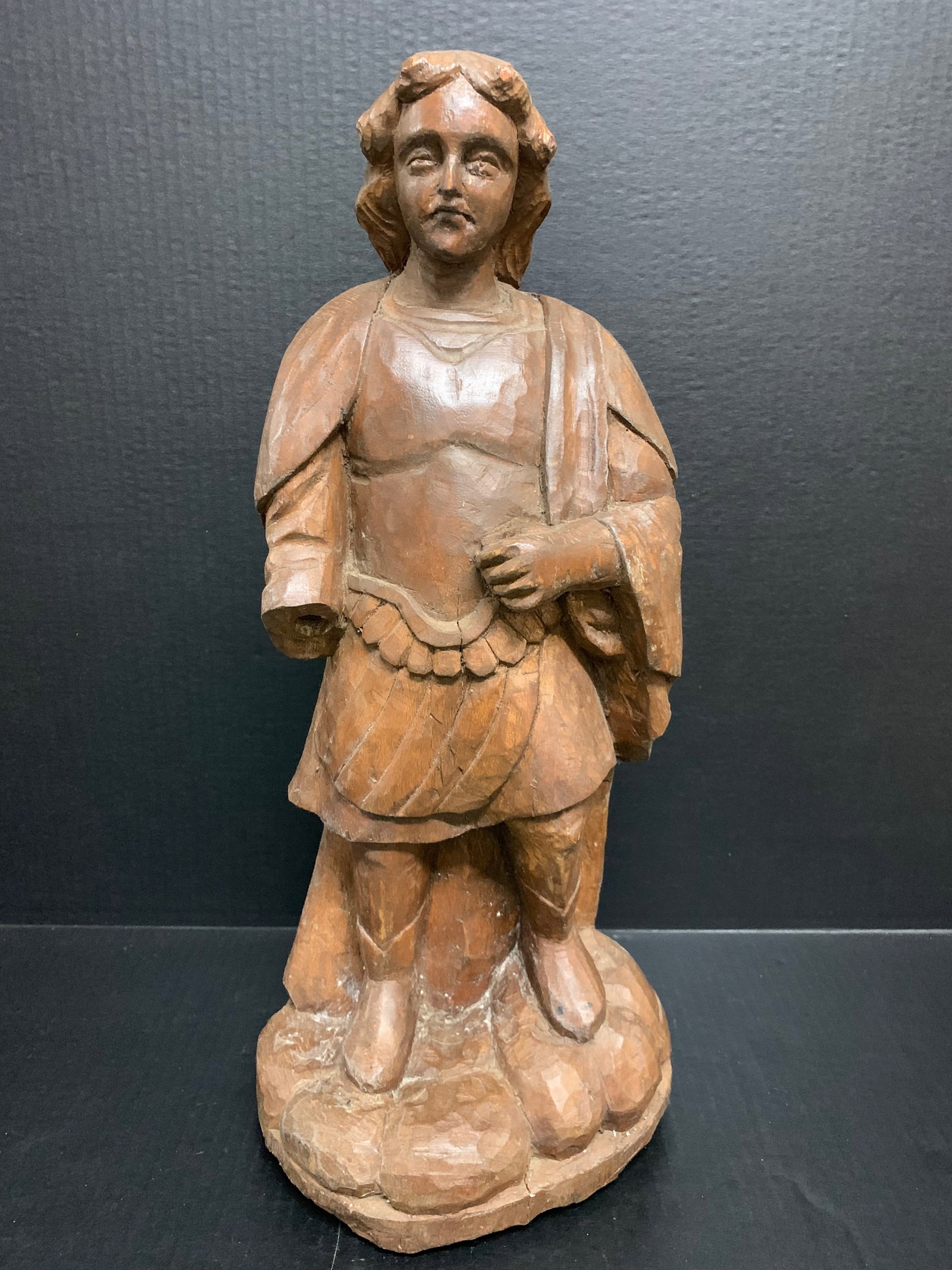 Carved Wood Saint Raphael Archangel Statue: Religious Art Carved Wood Saint Raphael Archangel Statue. The dimension is 20 inches high x 6.75 inches depth x 8.5 inches wide. Please be aware that some of the items are vintage, secondhand, old age