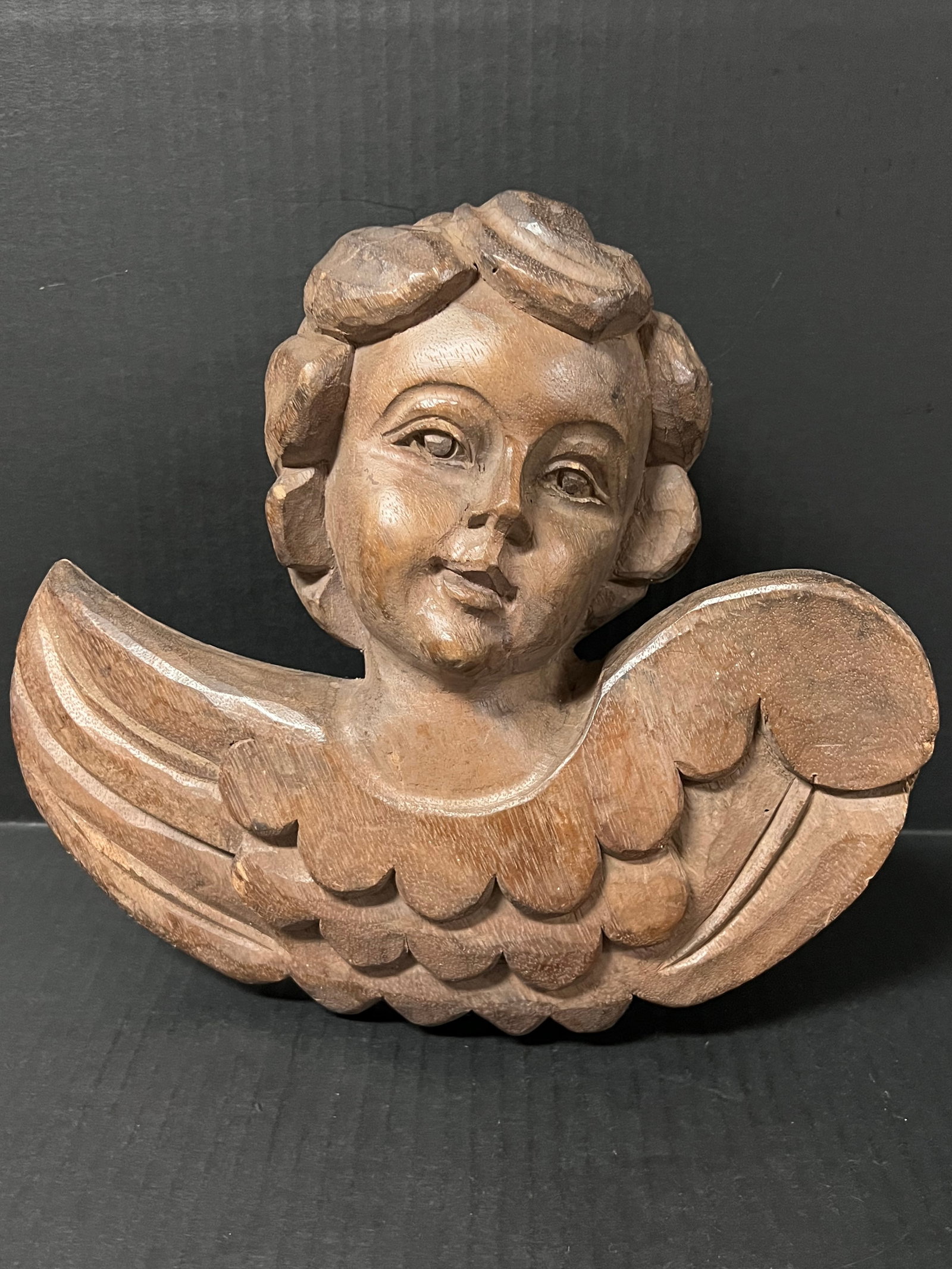 Carved Wood Cherub: Religious Art Carved Wood Cherub. The dimension is 10 inches high x 5 inches depth x 11 inches wide. Please be aware that some of the items are vintage, secondhand, old ages, antiques and may have a d
