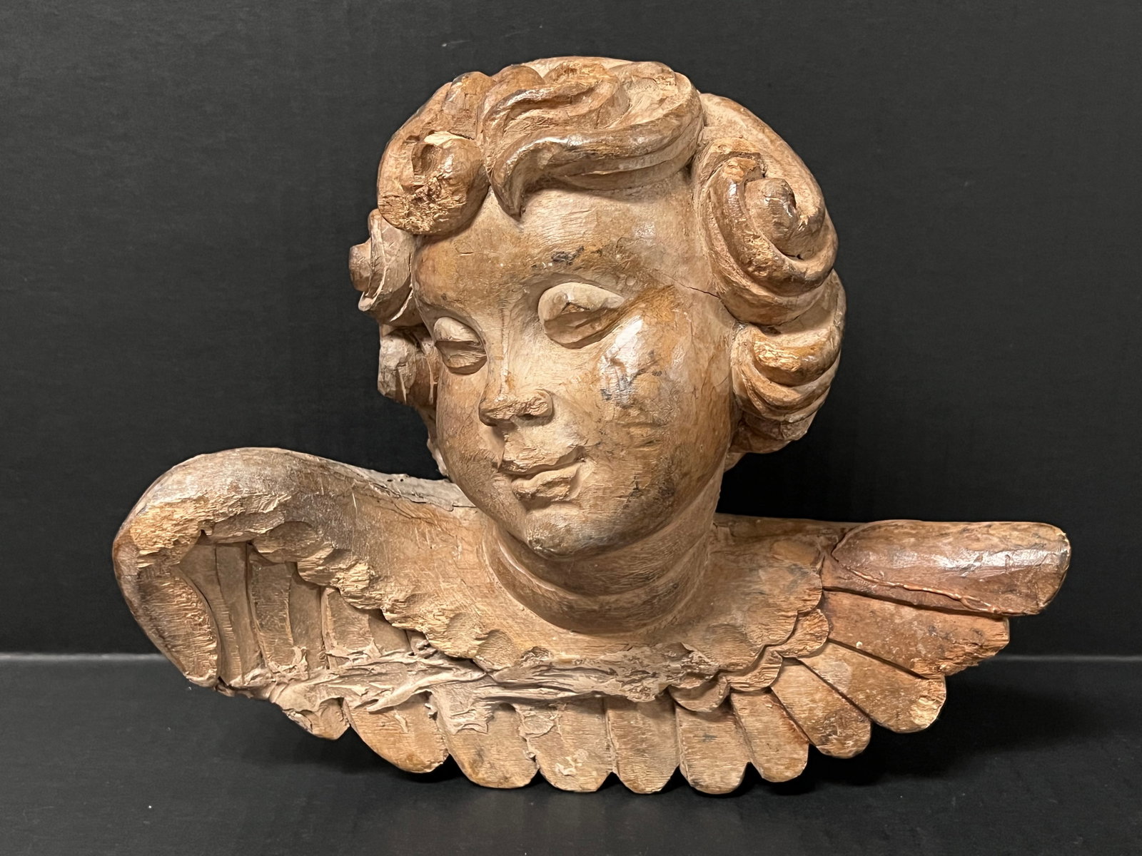 Carved Wood Cherub: Religious Art Carved Wood Cherub. The dimension is 8.5 inches high x 5.25 inches depth x 10.5 inches wide. Please be aware that some of the items are vintage, secondhand, old ages, antiques and may ha