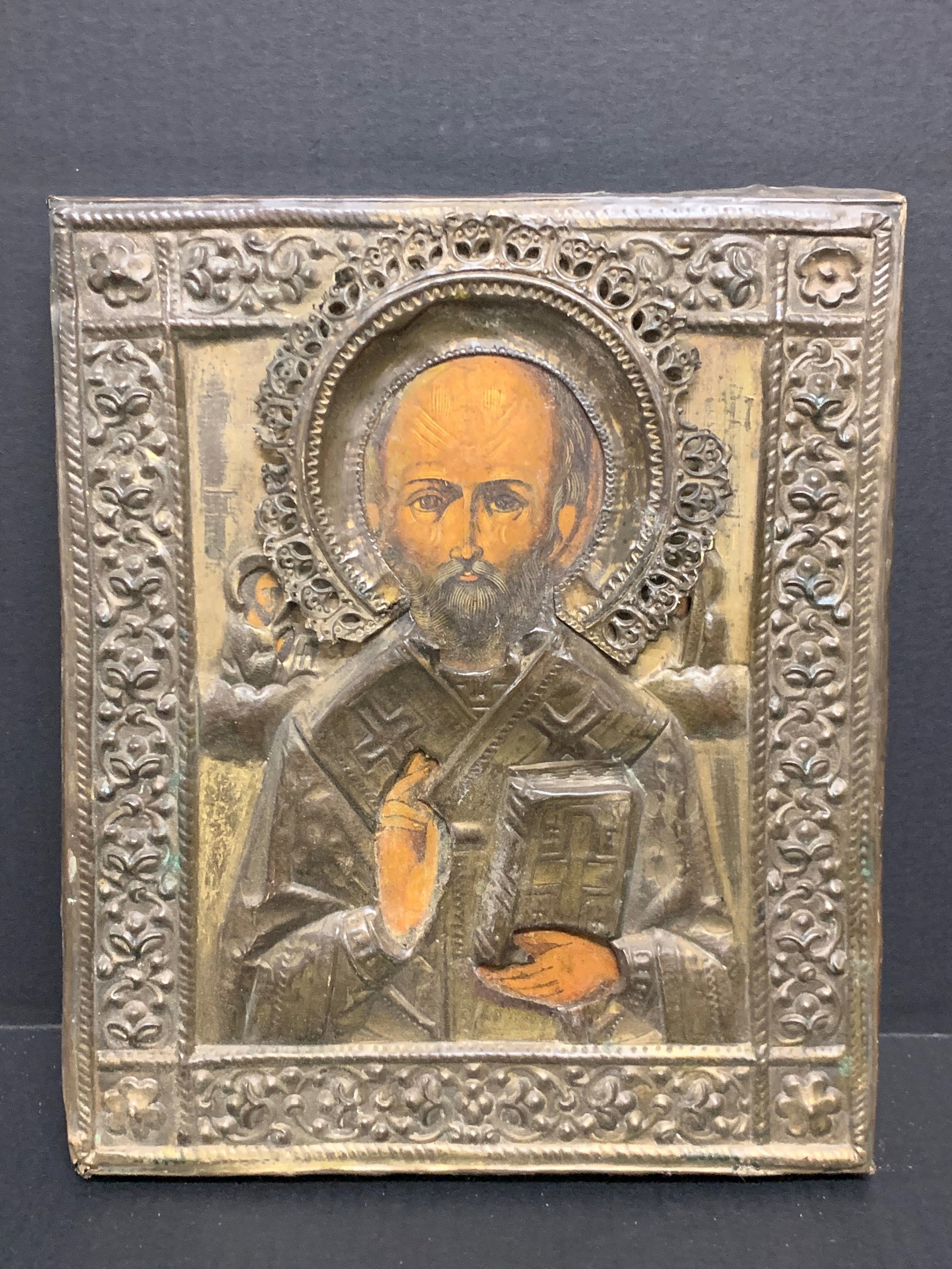 Russian Art Painted Icon with Metal Rissa: Religious Art Russian Art Painted Icon with Metal Rissa. The dimension is 12.5 inches high x 10.5 inches wide. Please be aware that some of the items are vintage, secondhand, old ages, antiques and