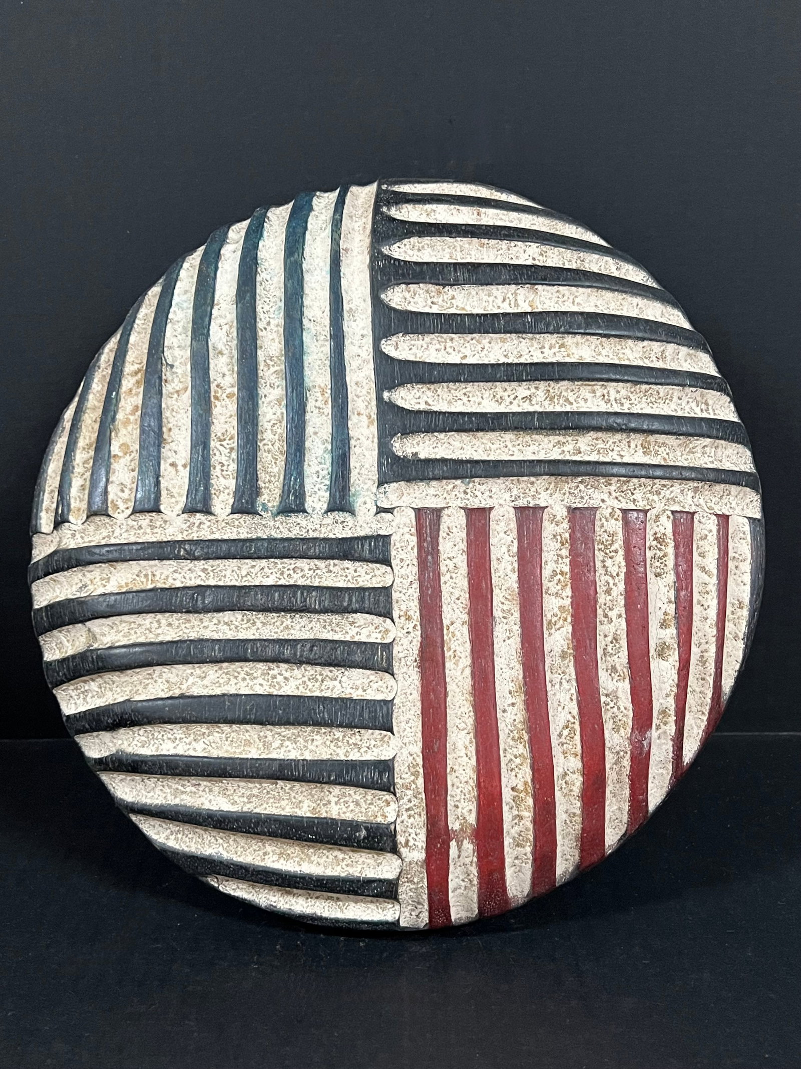Carved Wood Zulu Shield: African Tribal Art Carved Wood Zulu Shield. The dimension is 12.5 inches high x 12 inches wide. Please be aware that some of the items are vintage, secondhand, old ages, antiques and may have a