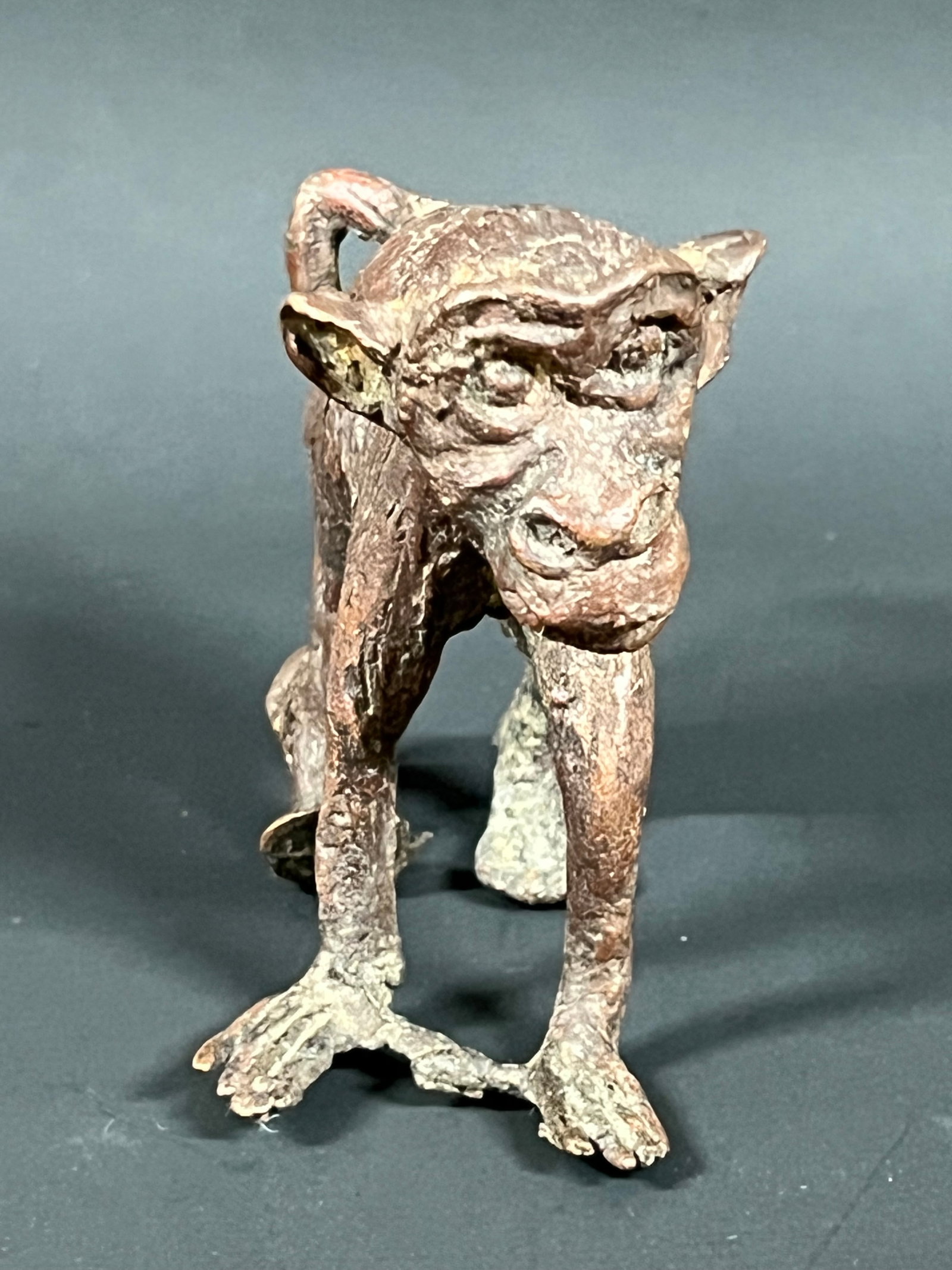 Bronze Monkey Sculpture: African Tribal Art Bronze Monkey Sculpture. The dimension is 3 inches high x 2.5 inches depth x 3.5 inches wide. Please be aware that some of the items are vintage, secondhand, old ages, antiques and