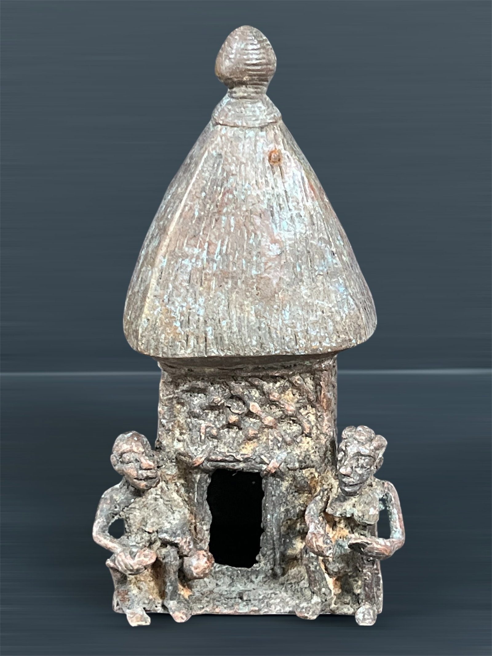 Bronze House Sculpture: African Tribal Art Bronze House Sculpture. The dimension is 6.75 inches high x 3.75 inches wide. Please be aware that some of the items are vintage, secondhand, old ages, antiques and may have a