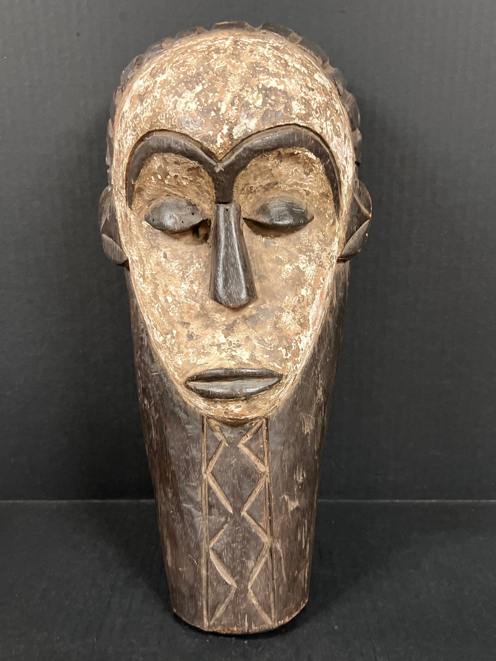 Fang Mask: African Tribal Art Fang Mask. The dimension is 16 inches high x 8 inches wide. Please be aware that some of the items are vintage, secondhand, old ages, antiques and may have a defects or sign of ages