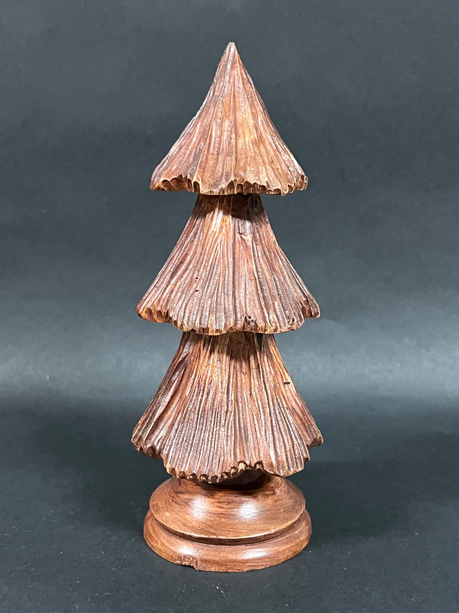 Carved Wood Christmas Tree: Folk Art Carved Wood Christmas Tree. The dimension is 9.5 inches high x 4 inches wide. Please be aware that some of the items are vintage, secondhand, old ages, antiques and may have a defects or sign