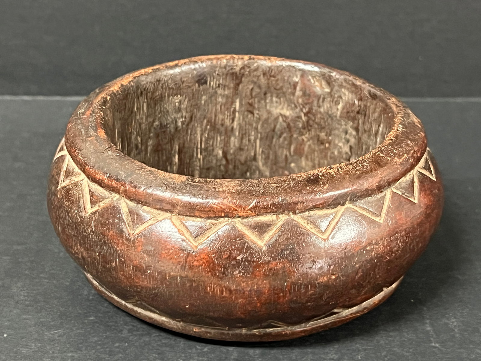 Carved Wood Nigerian Currency Bracelet: African Tribal Art Carved Wood Nigerian Currency Bracelet. The dimension is 5.5 inches high x 2.25 inches wide. Please be aware that some of the items are vintage, secondhand, old ages, antiques and m