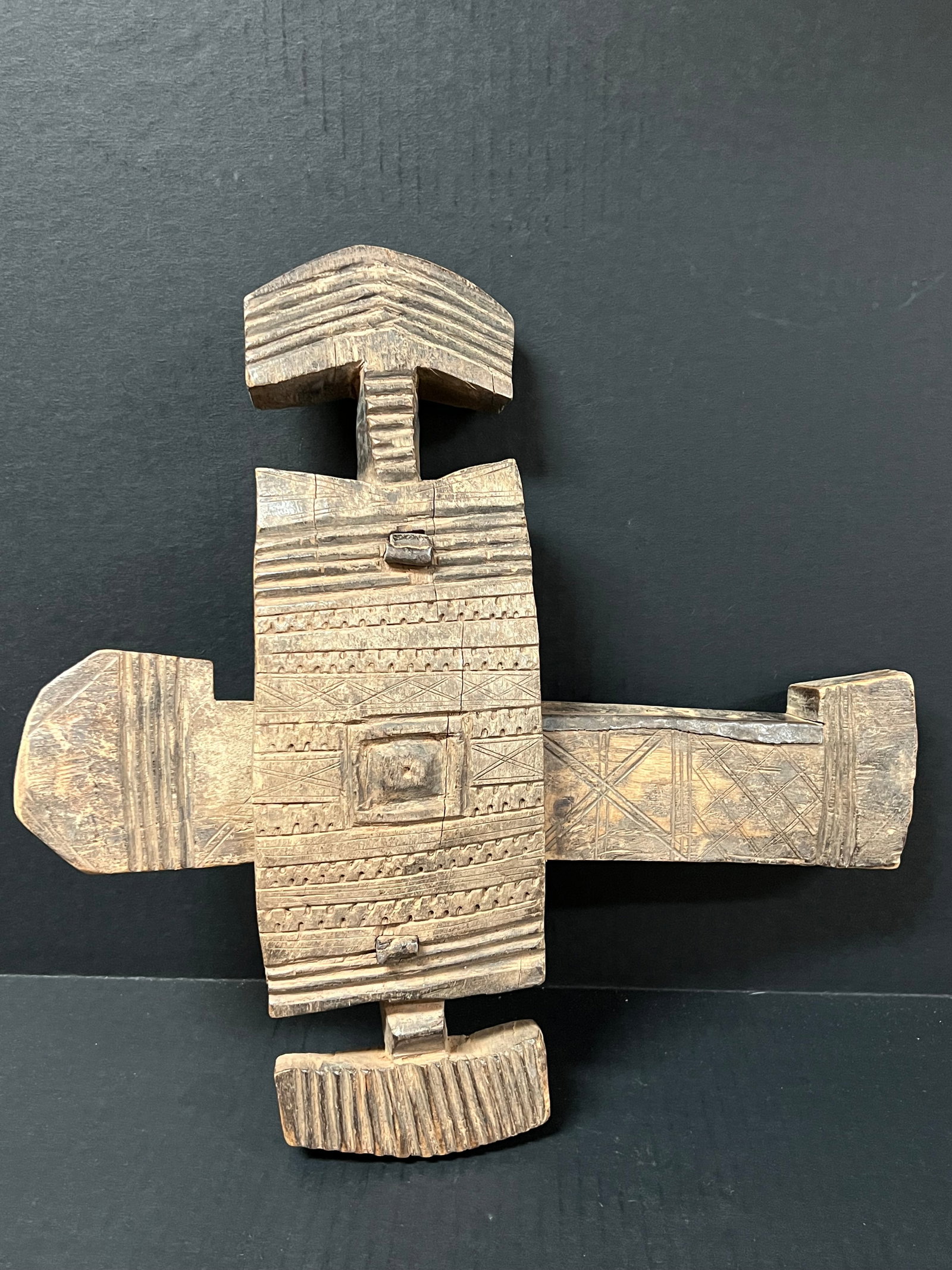 Carved Wood Door Lock: African Tribal Art Carved Wood Door Lock. The dimension is 15.5 inches high x 15 inches wide. Please be aware that some of the items are vintage, secondhand, old ages, antiques and may have a defects 
