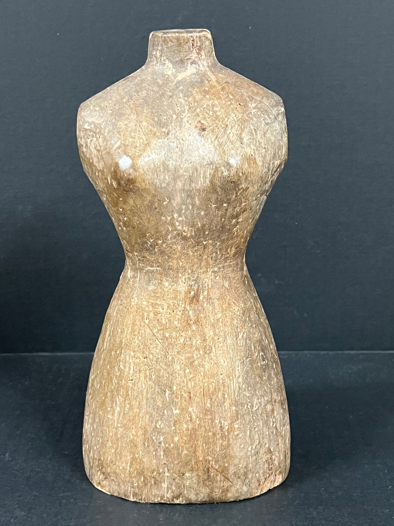 Carved Wood Mannequin - Torso: Folk Art Carved Wood Mannequin. The dimension is 10.25 inches high x 5 inches wide. Please be aware that some of the items are vintage, secondhand, old ages, antiques and may have a defects or sign of