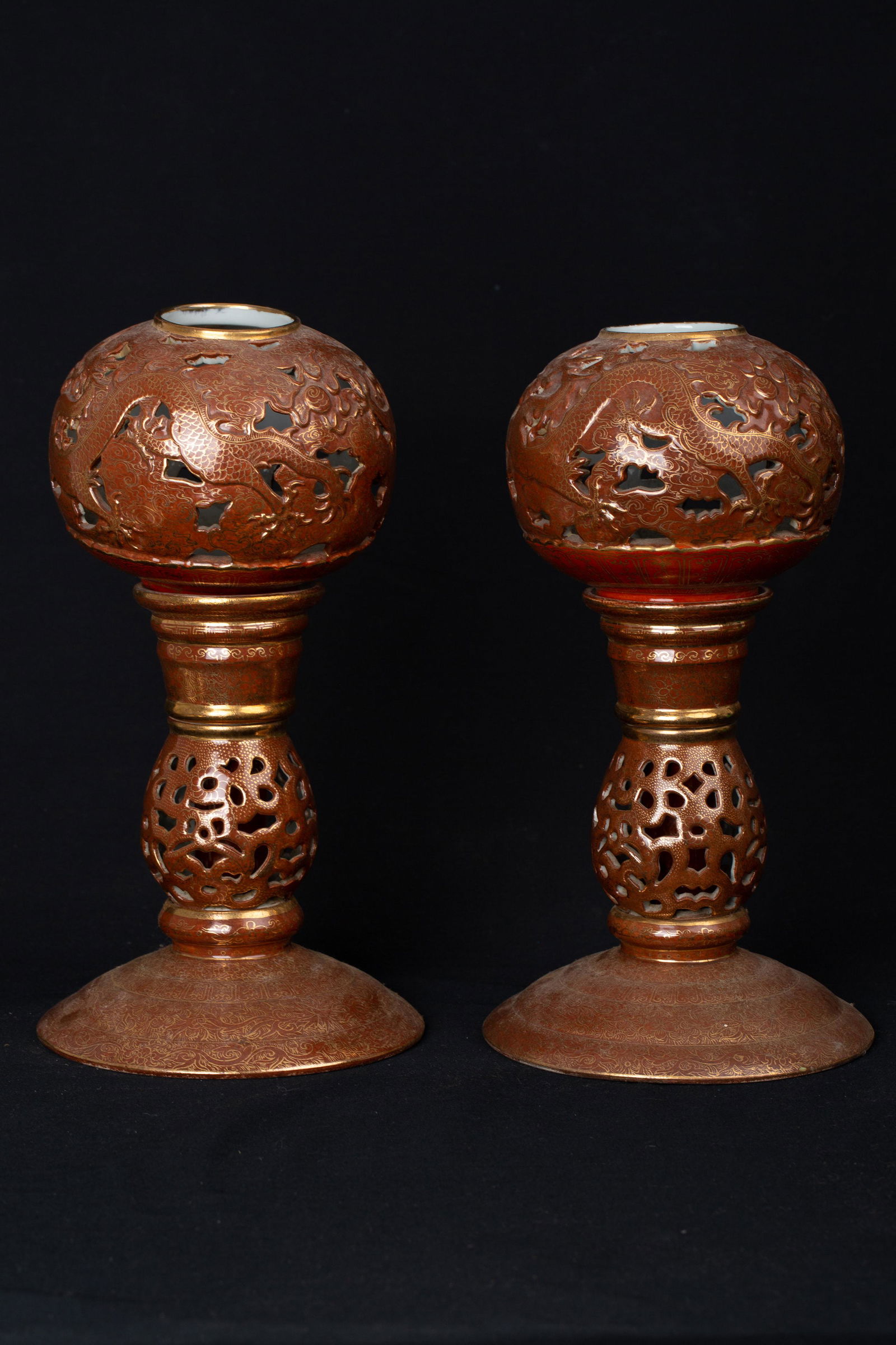 A PAIR OF 20TH CENTURY SHALLOW CRIMSON CANDLE HOLDERS (1 of 6)