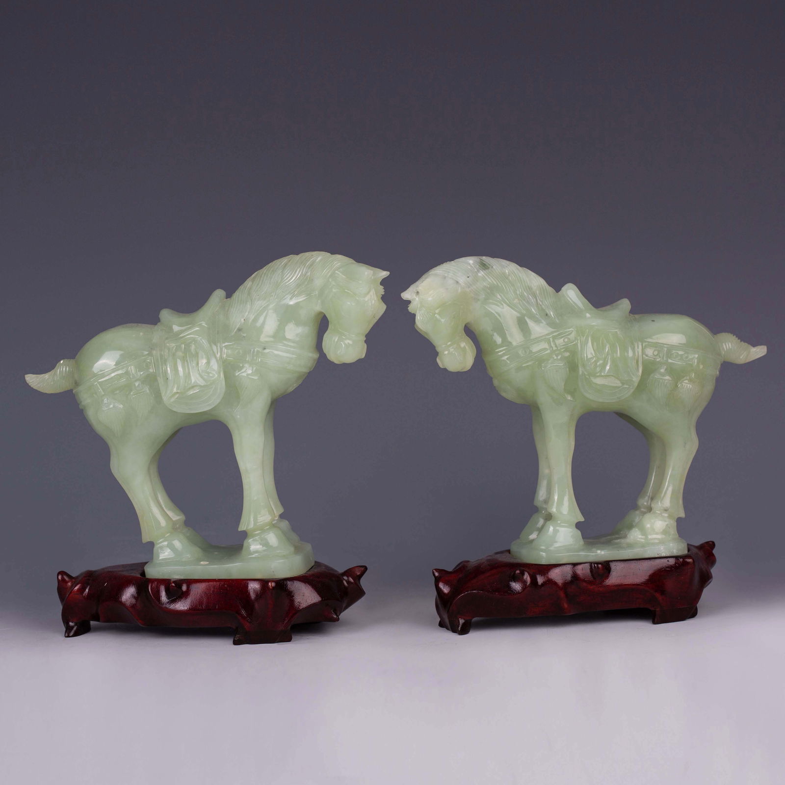 Celadon jade horses, 20th century: Celadon jade horses, 20th century. L 16cm, H 15.5cm, W 6cm