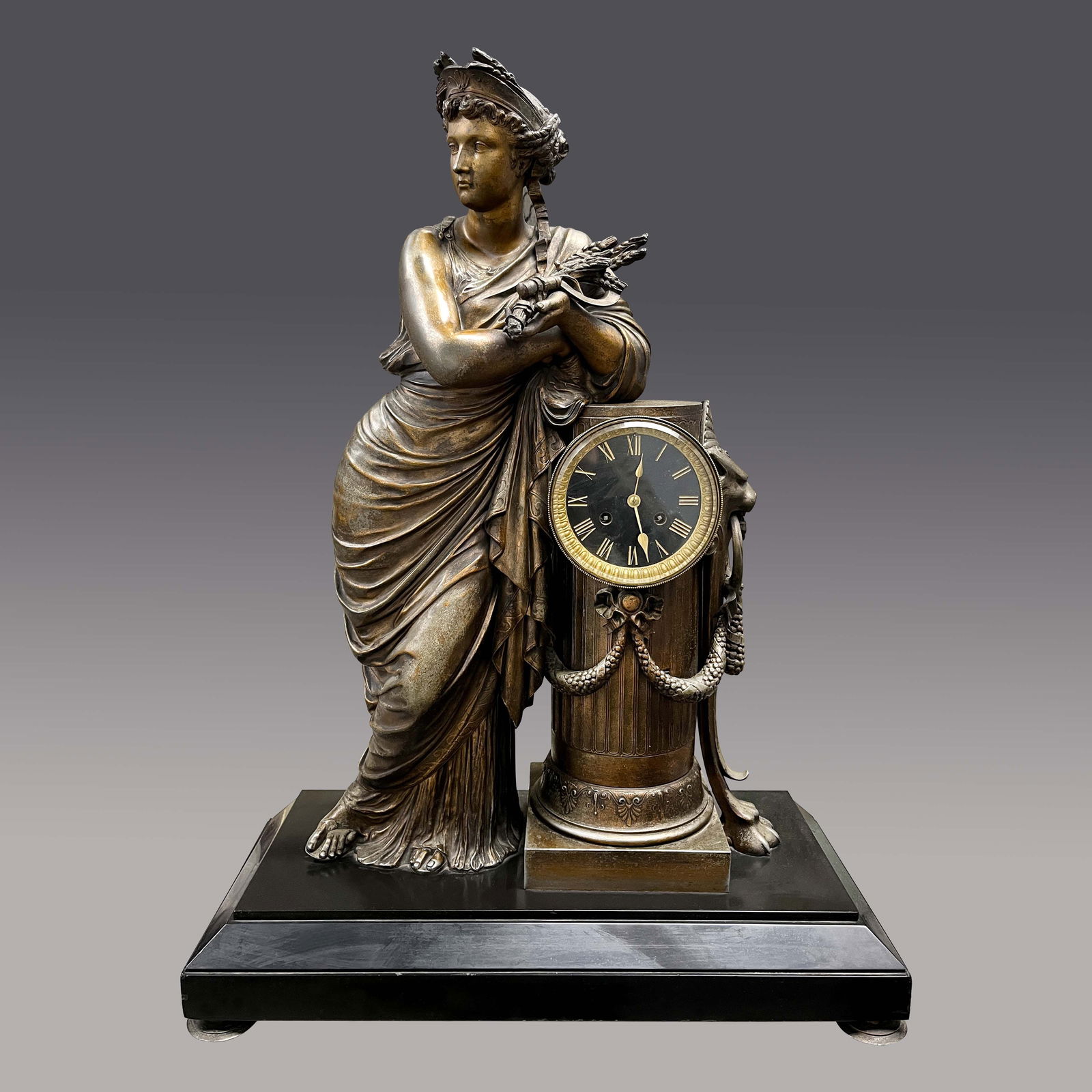 France, extra large patinated spelter figural clock, depicting a tall woman (1 of 3)