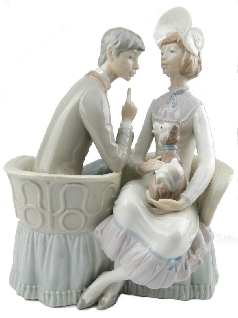 LLADRO "YOU AND ME" PORCELAIN FIGURE RETIRED 4830: Lladro Spanish glazed porcelain sculpture depicting a man and woman seated in chairs with dogs number 4830 titled "You and Me" or "Tu y Yo". Sculpted by Julio Fernandez. Issued in 1972 and retired in