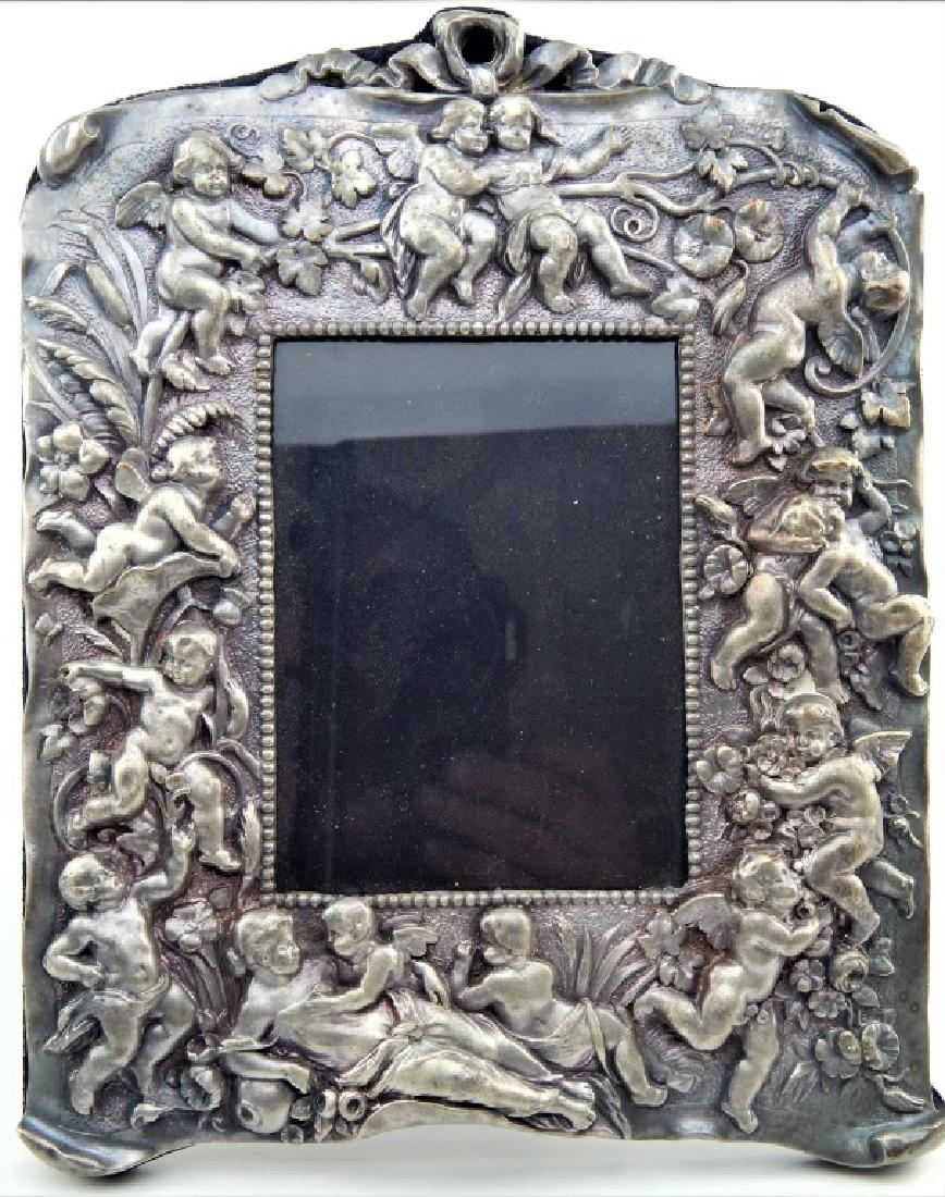 BRITANNIA SILVER REPOUSSE CHERUBS PICTURE FRAME (1 of 9)