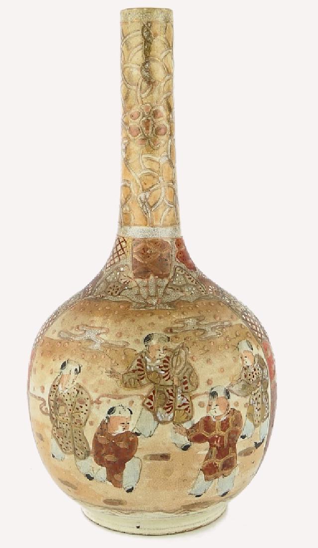 ANTIQUE SATSUMA PORCEALIN CHILDREN BOTTLE VASE: Antique Satsuma Japanese porcelain vase of bottle form depicting children in exterior scenes. Circa Edo to Meiji period. Measures approx. 9 3/8" height x 5 1/2" diameter.